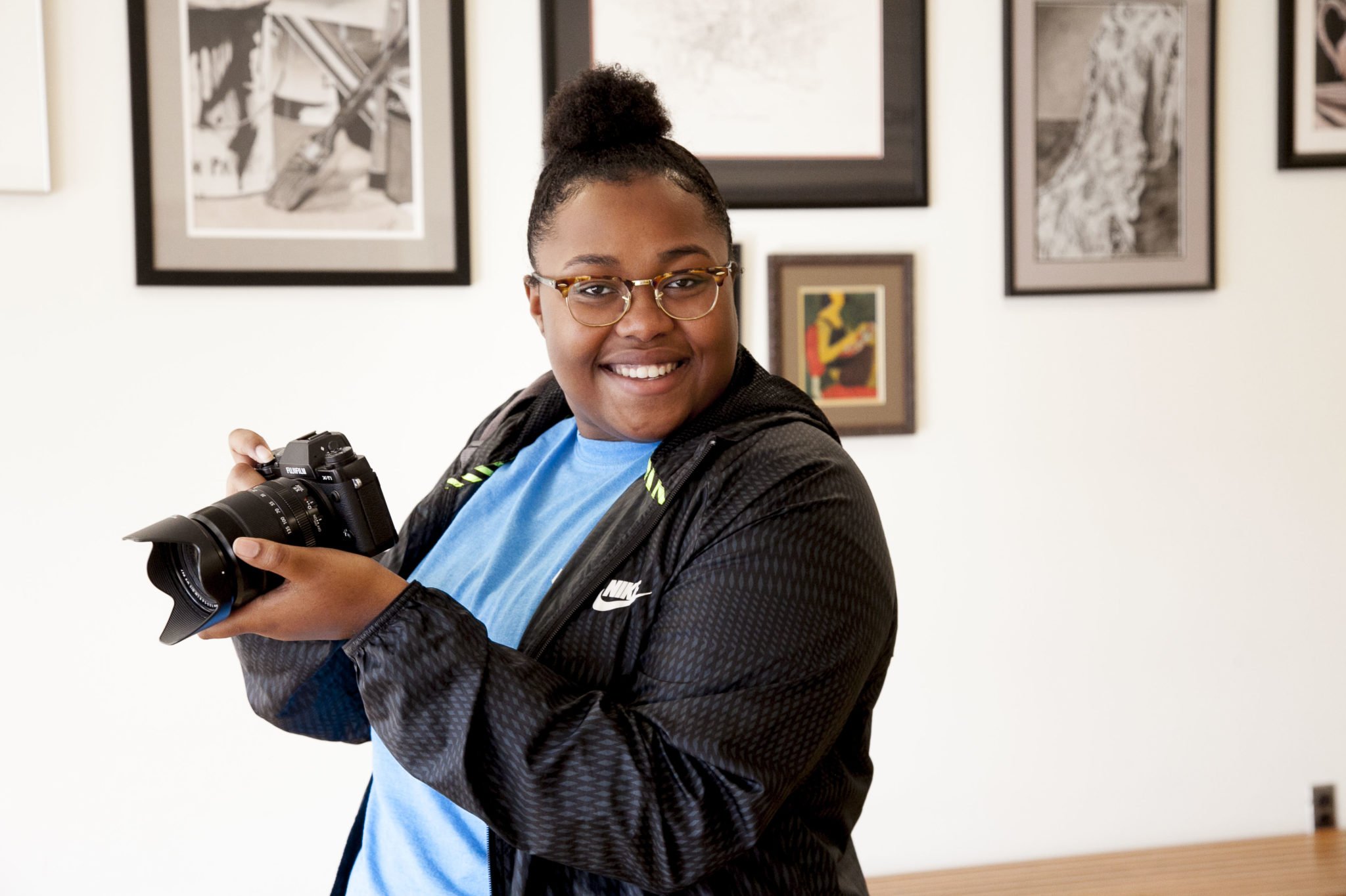 student with camera