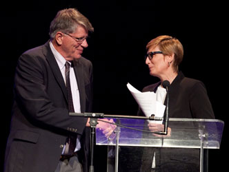 two people at podium