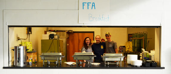 people standing at breakfast