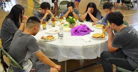 students praying