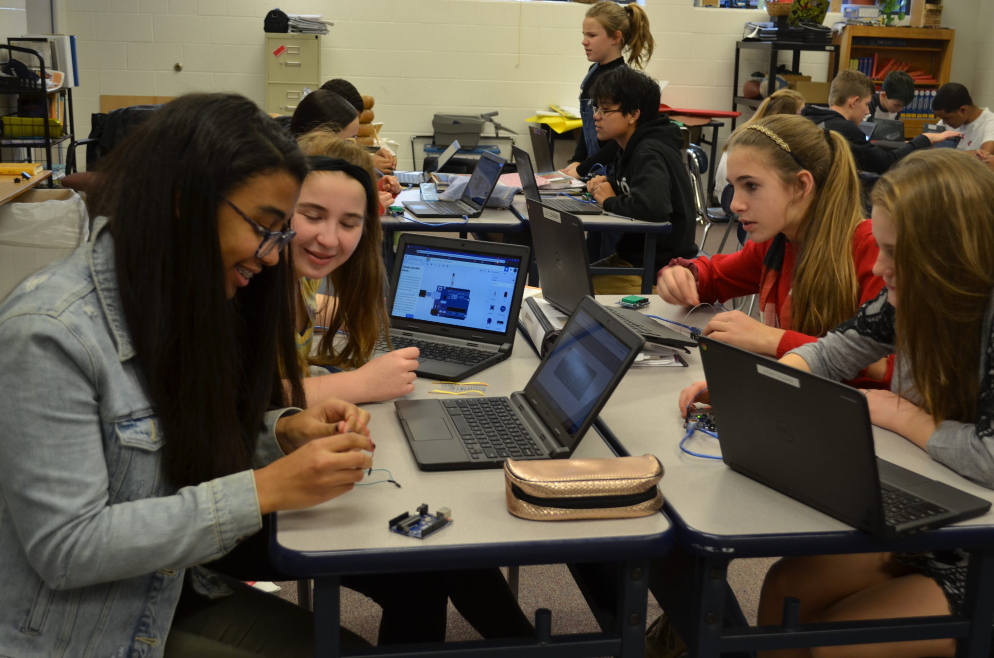 students working on a robot