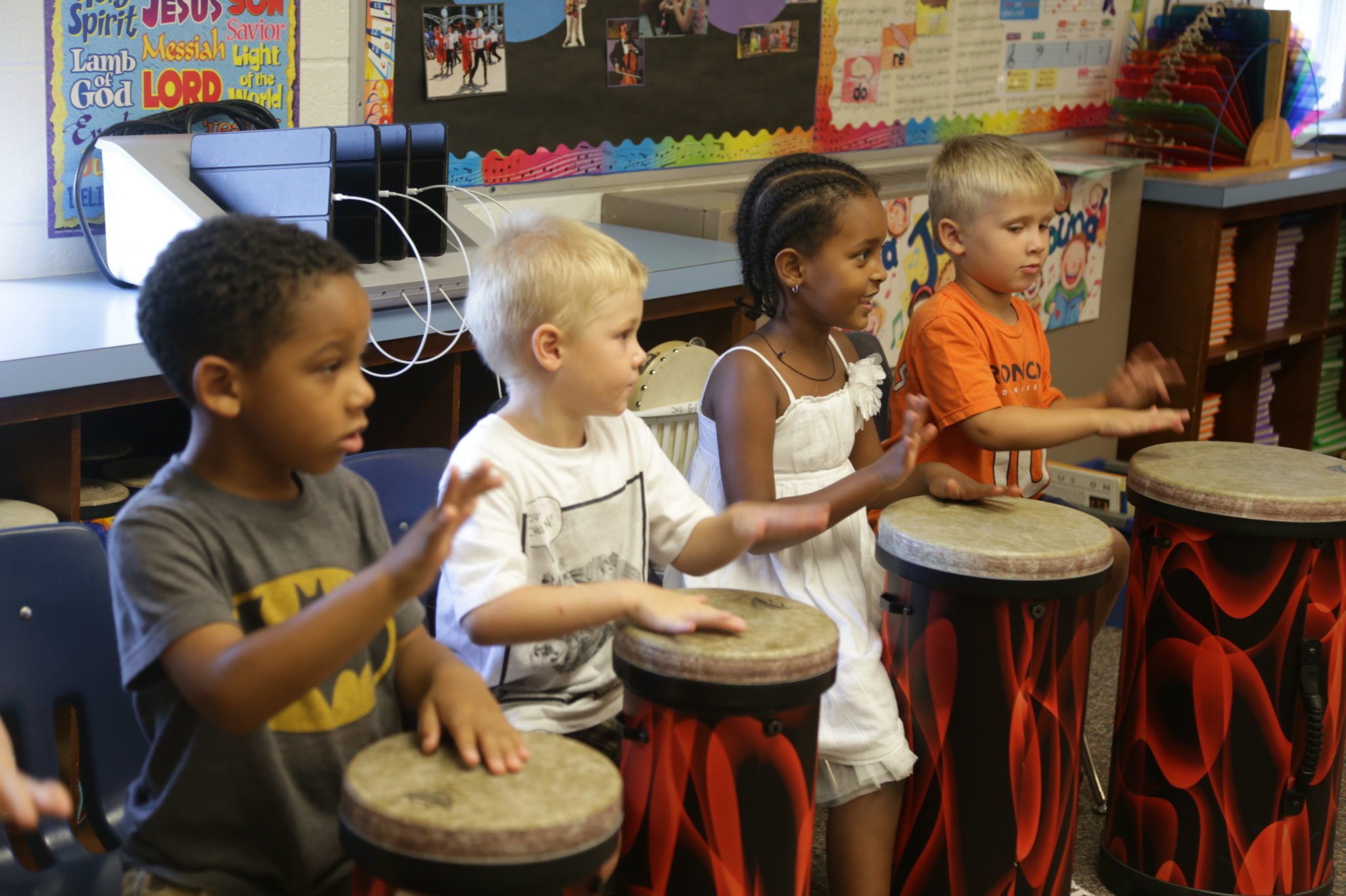 students playing drums in classroom