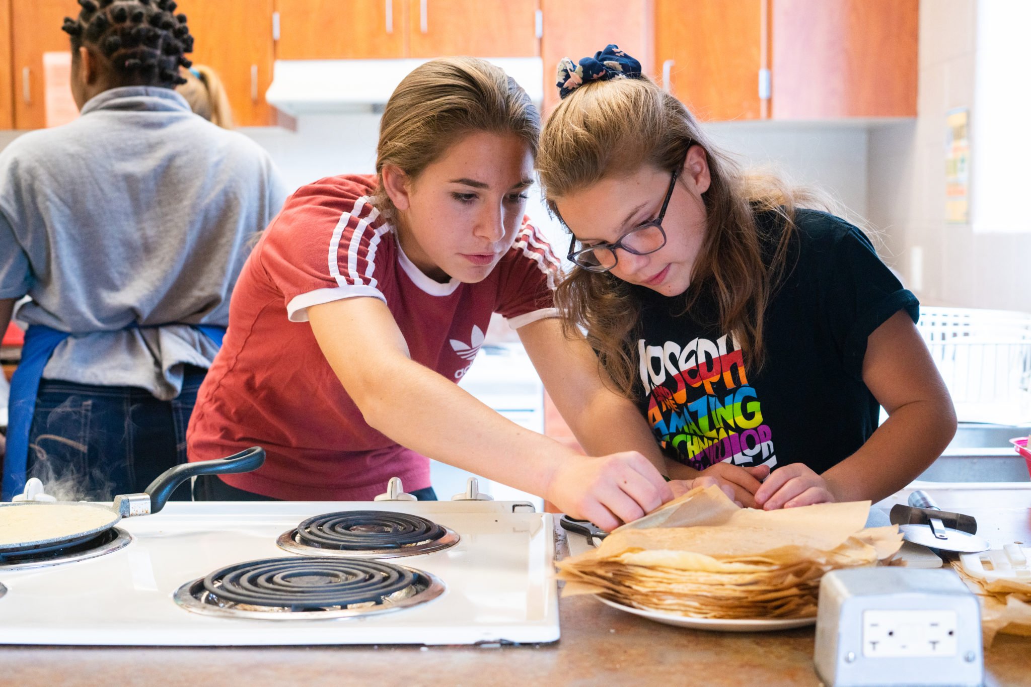 students making food during homec class