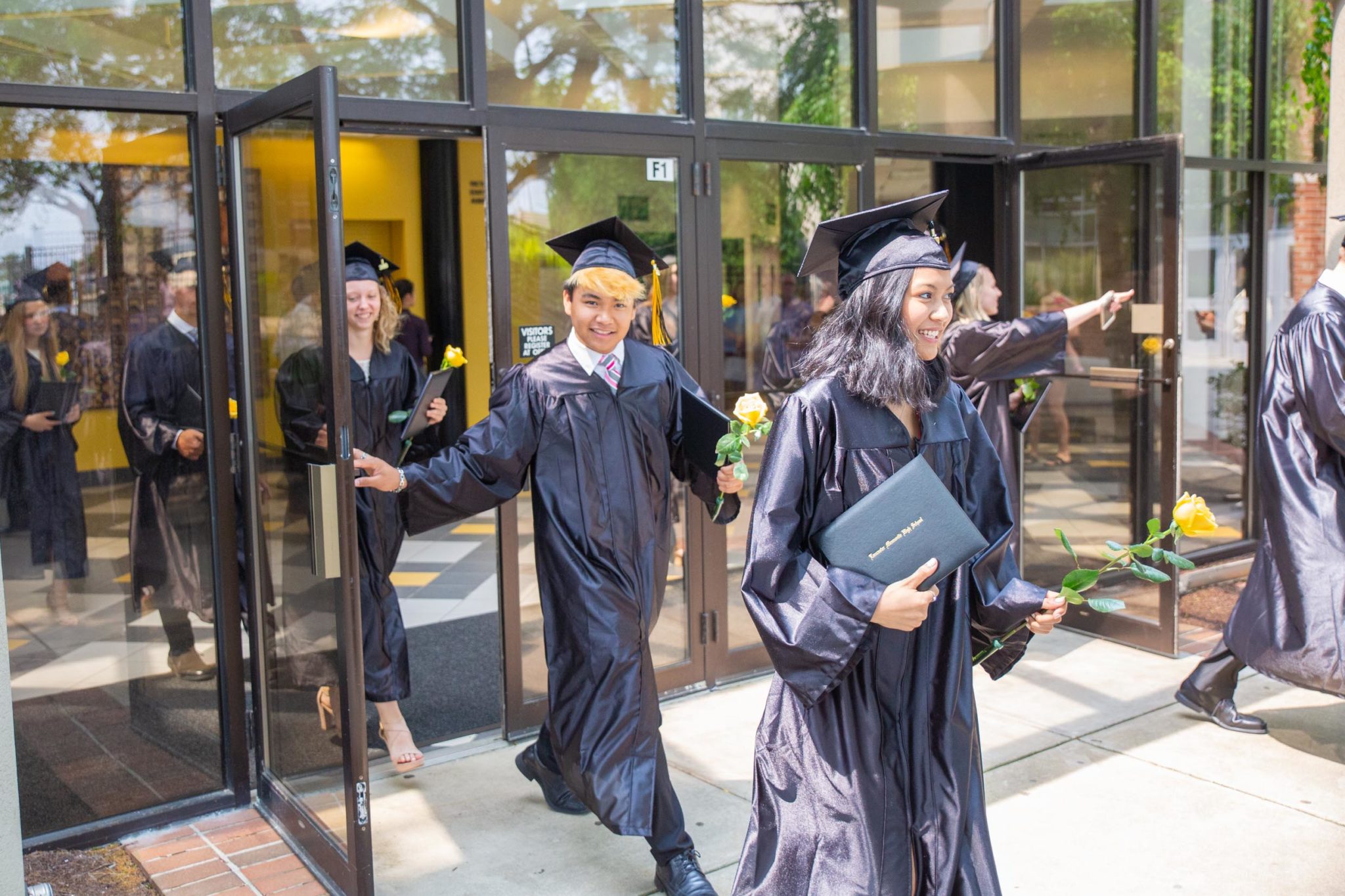 Students together after graduation