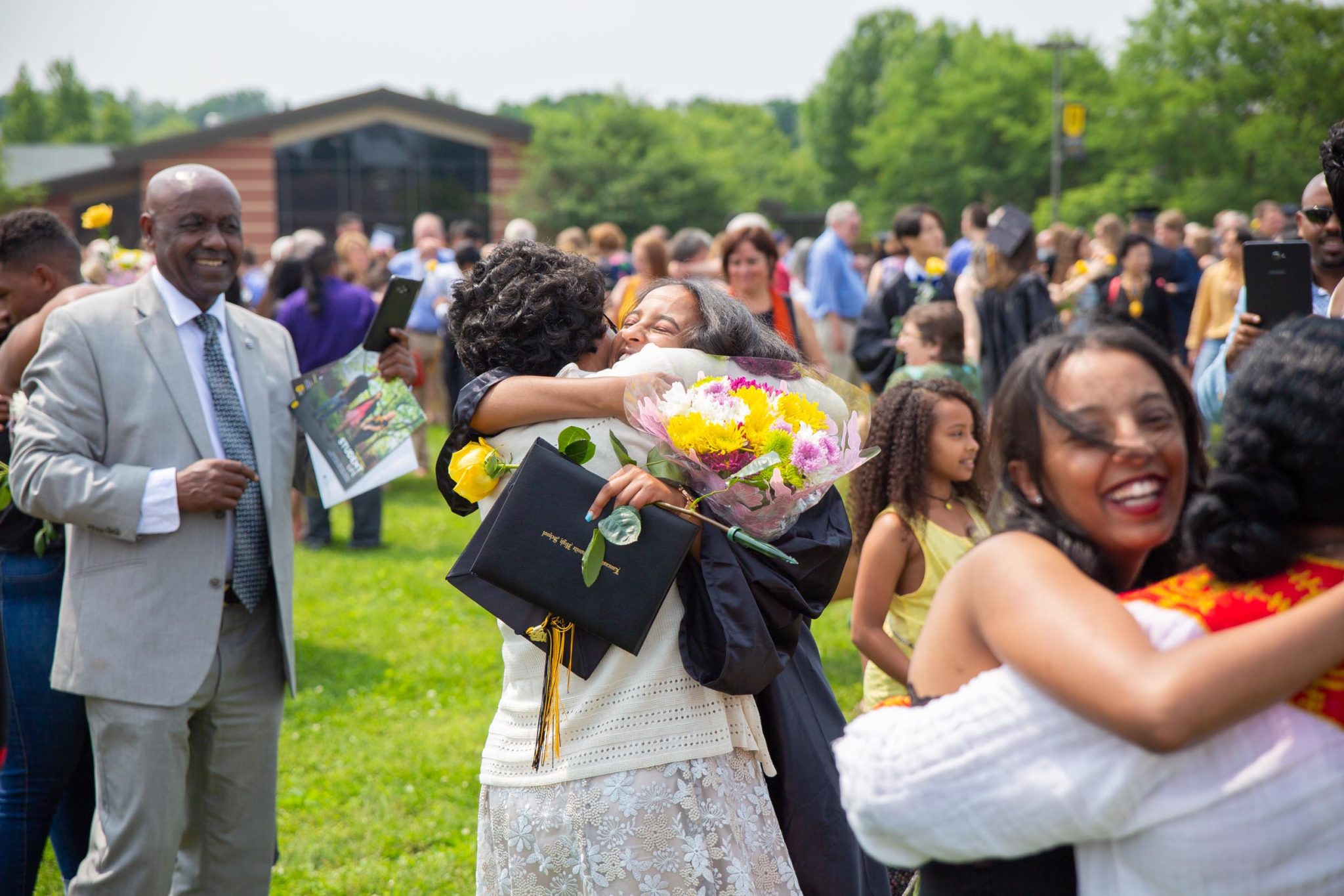 Students together after graduation