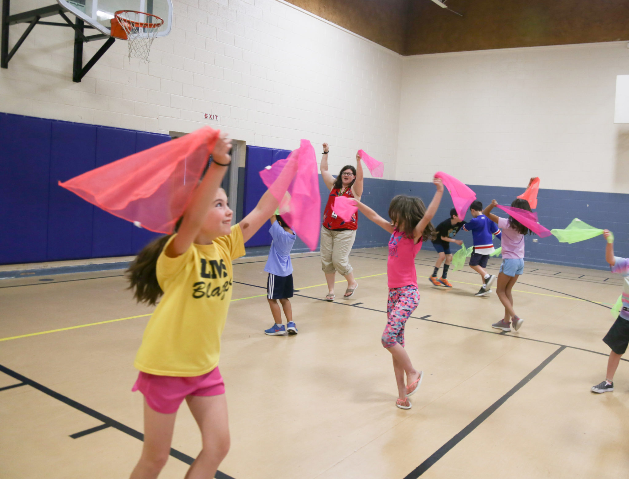 students participating in dance in gymnasium