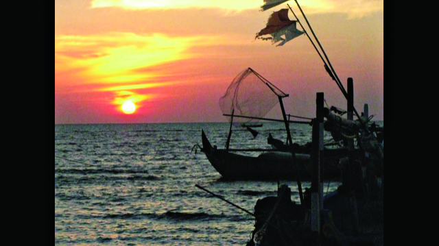 sunset photo with boats