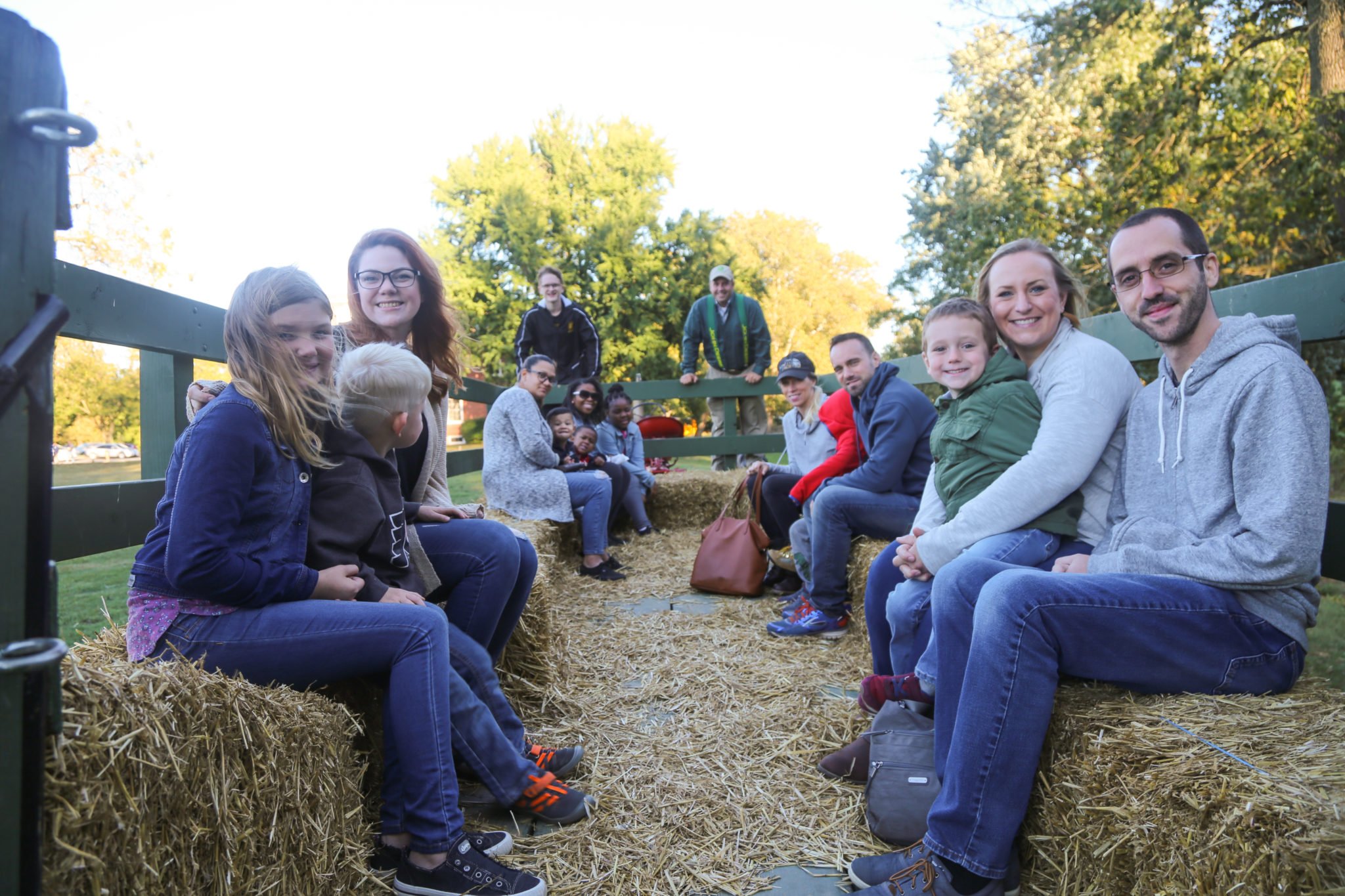 families enjoying a hayride during homecoming 2019