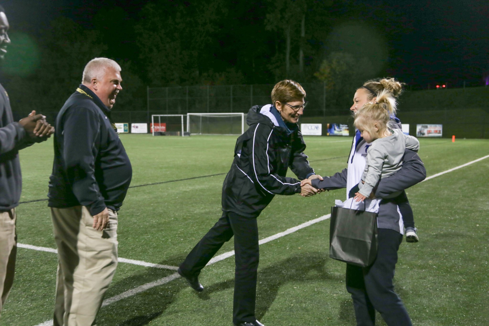 families celebrated out on athletic fields