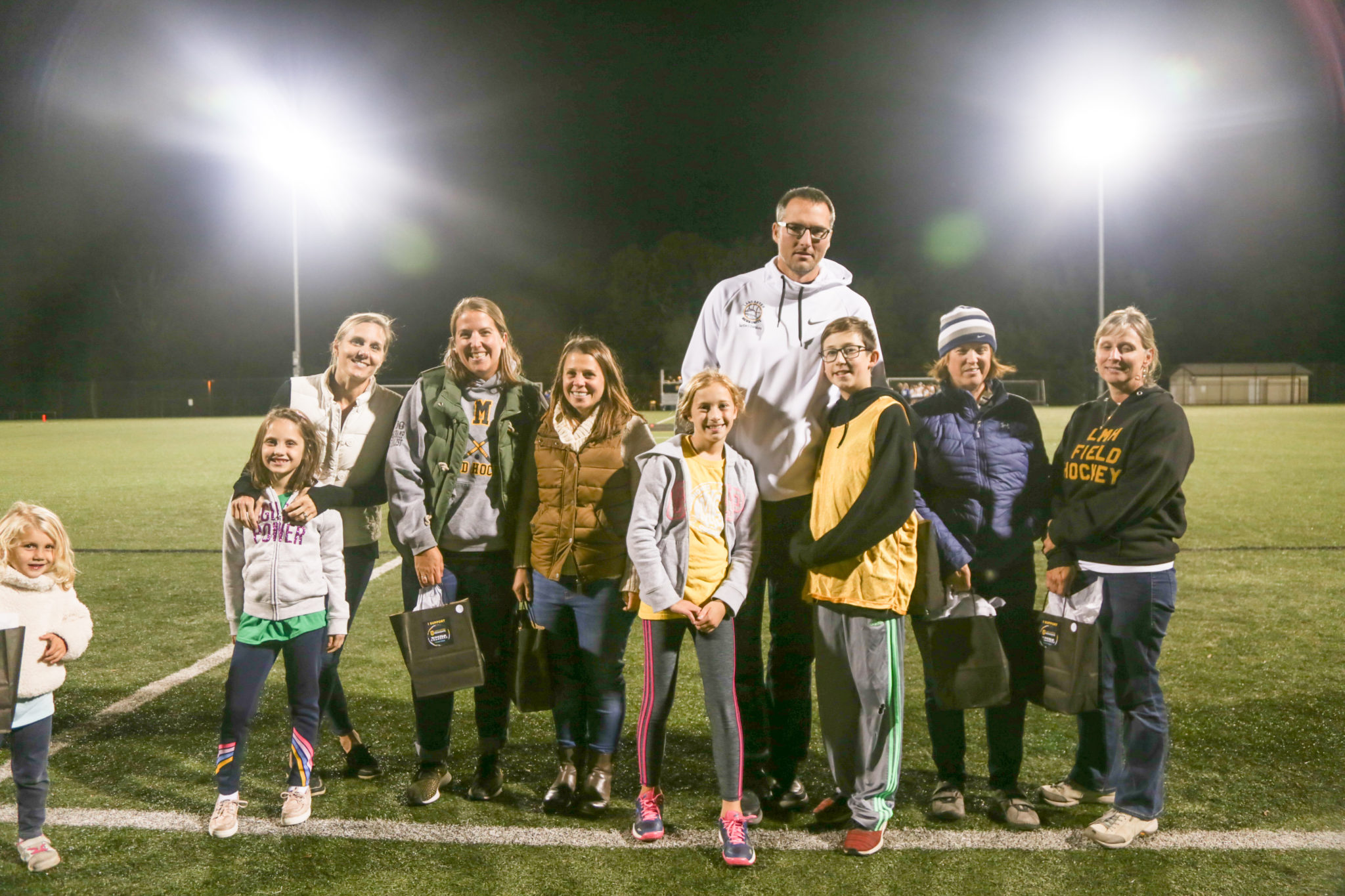 families celebrated out on athletic fields