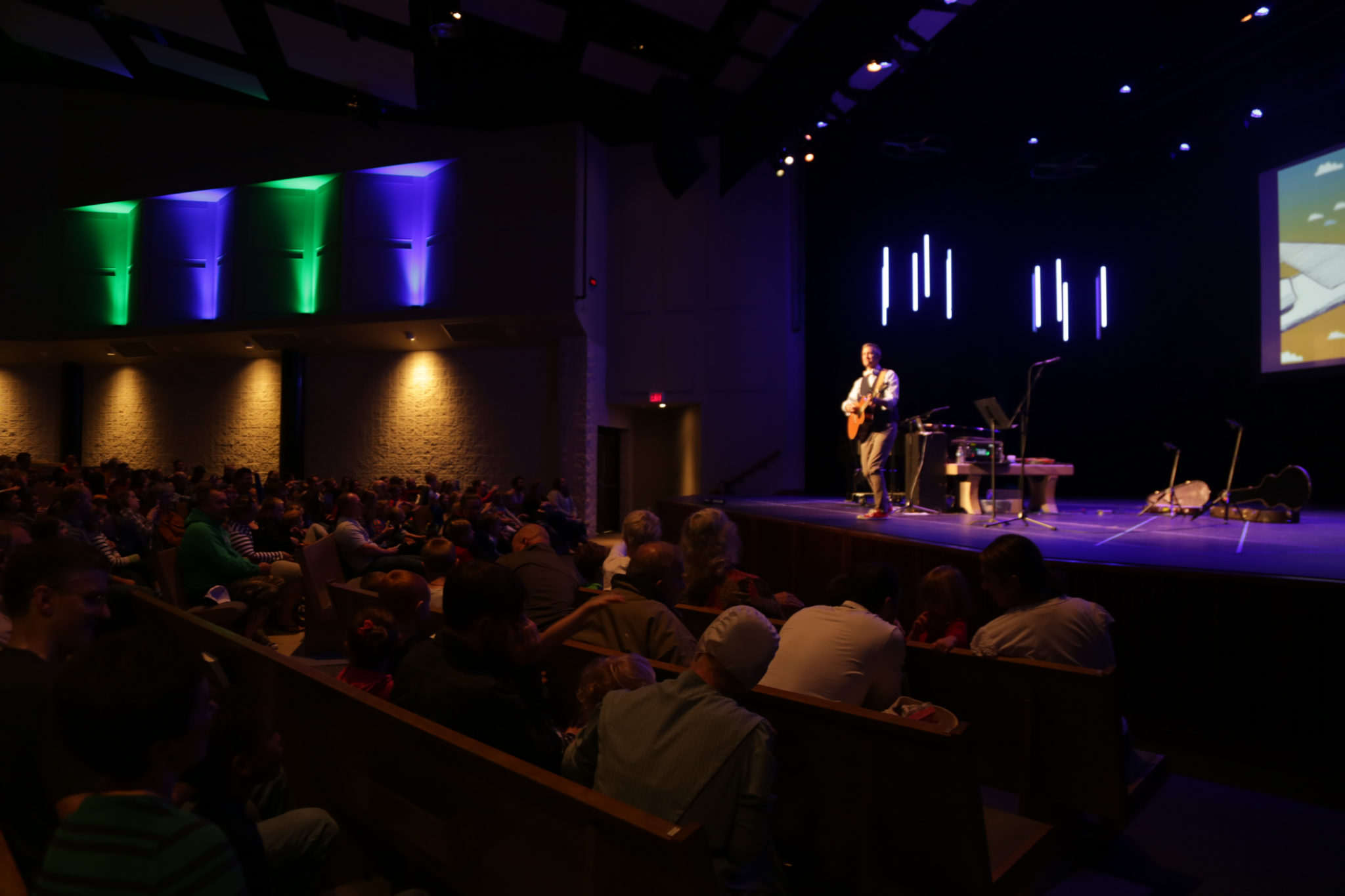 Speaker for chapel playing guitar