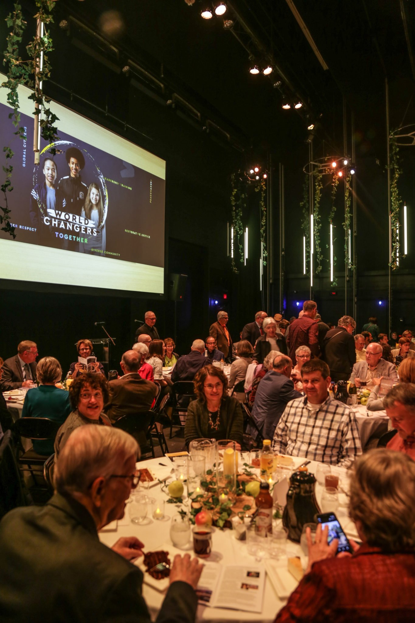 Gala Participants at tables at the silent auction