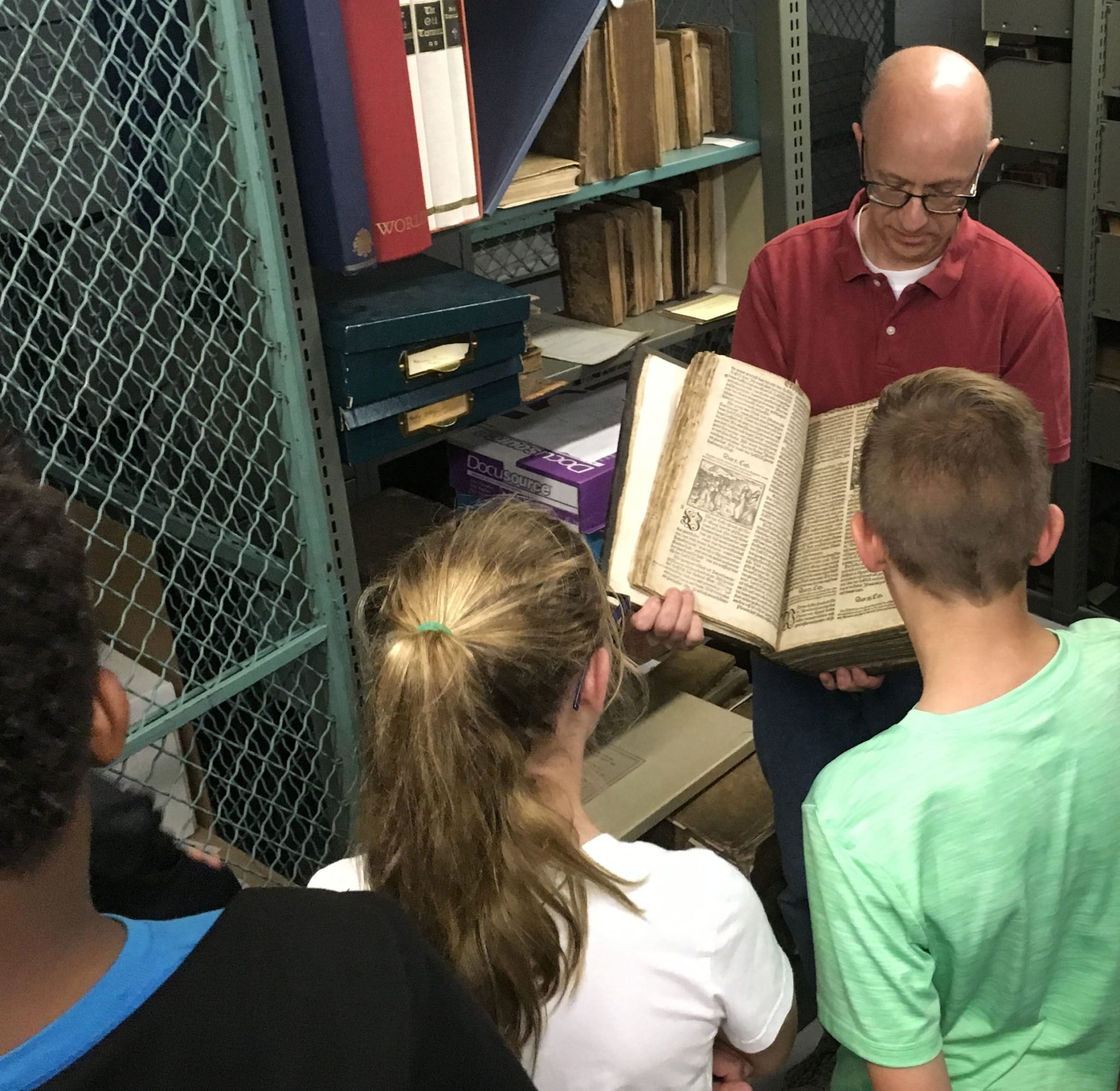 Steve Ness reveals the 1556 Zurich Bible.