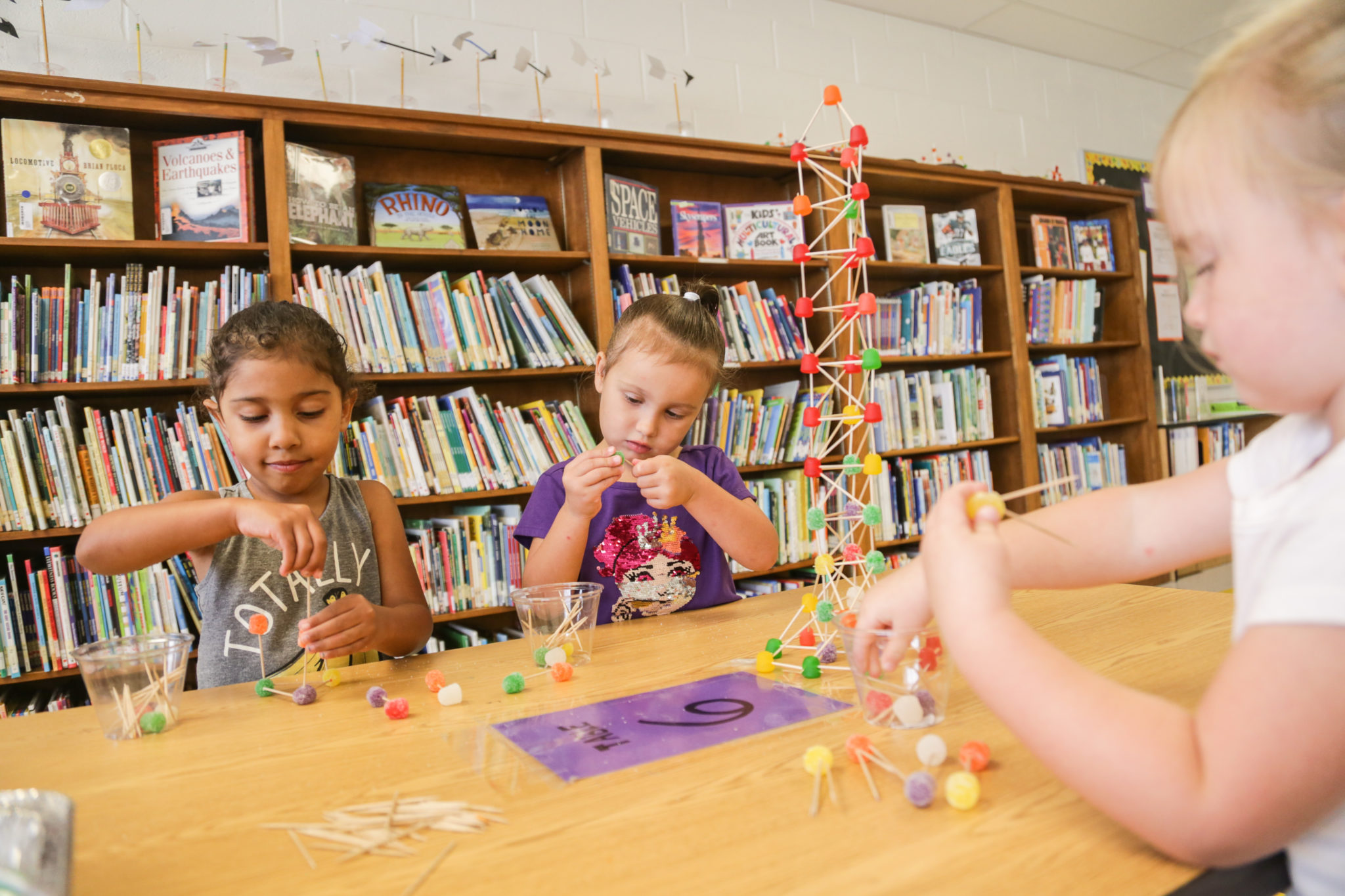 students building with tooth picks and candy