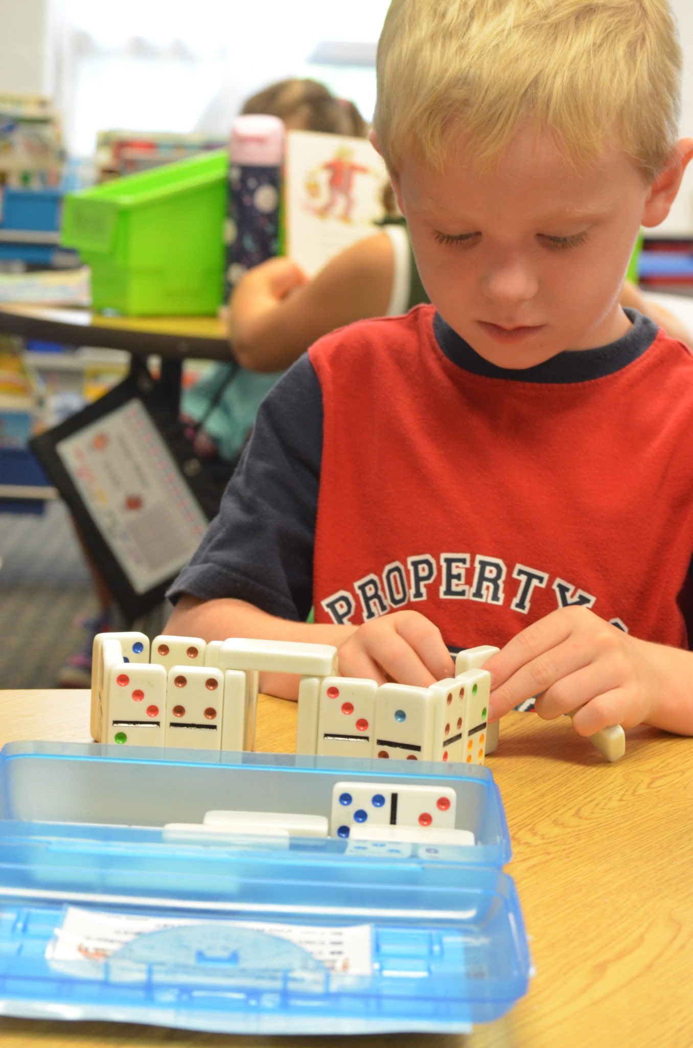 Child learning with dominoes