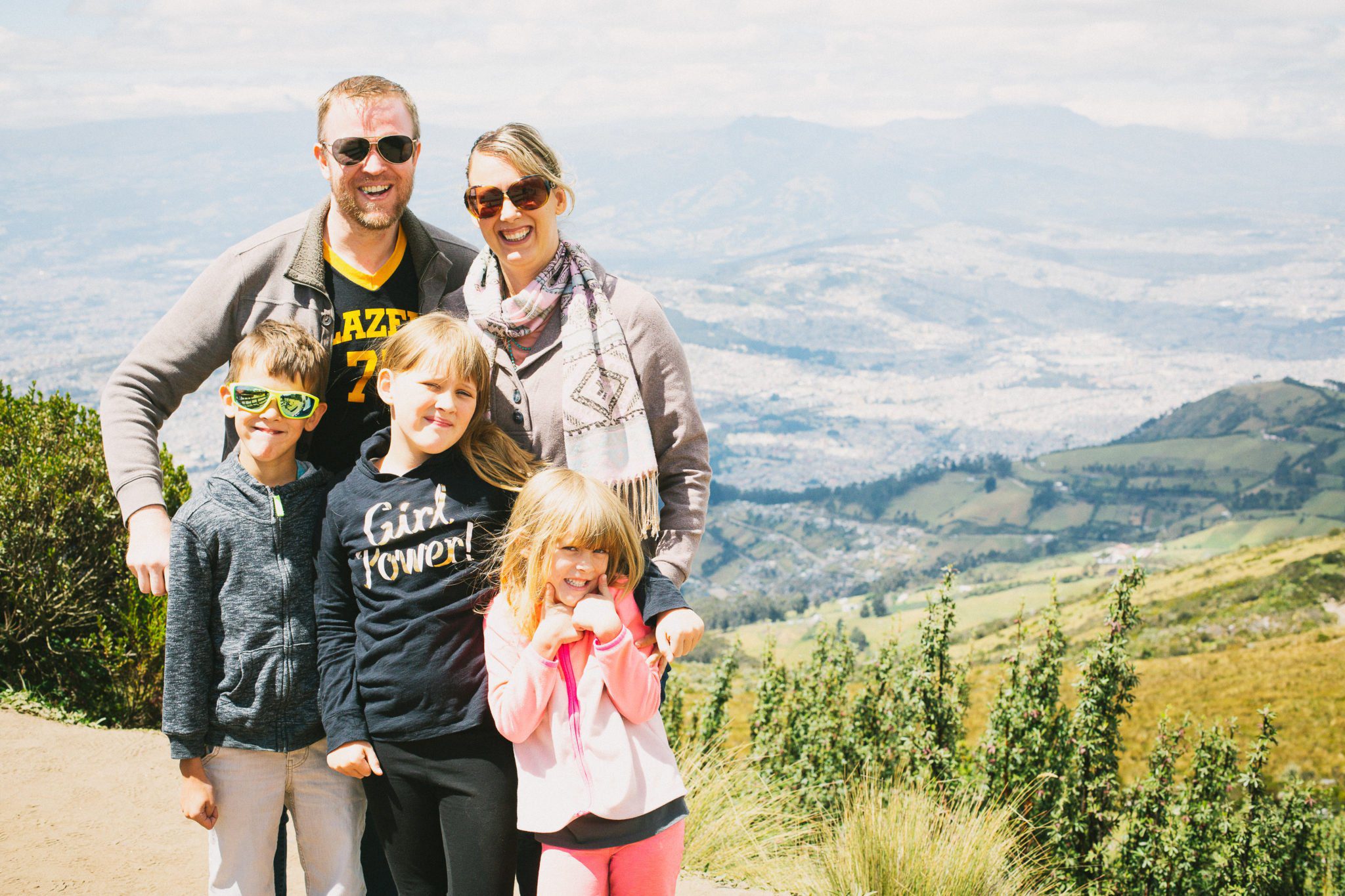 Carlson family photo with scenic background