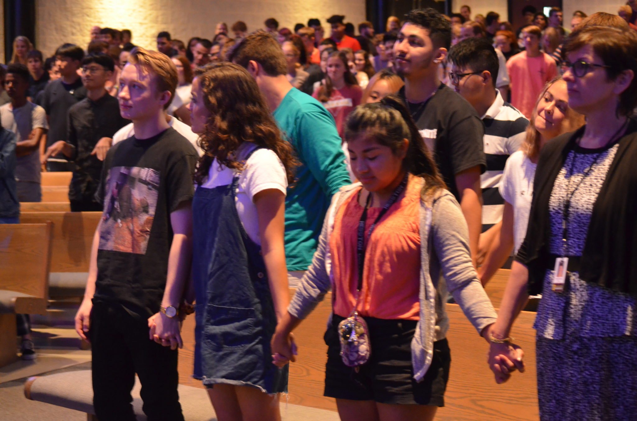 students praying at LMH Chapel