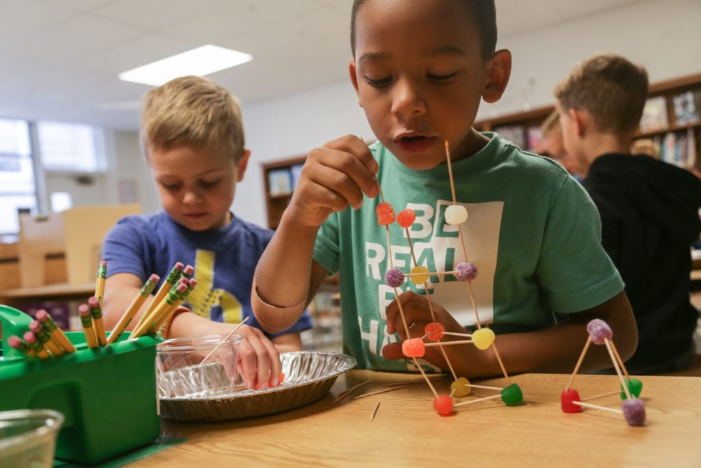 students building with candy & toothpicks
