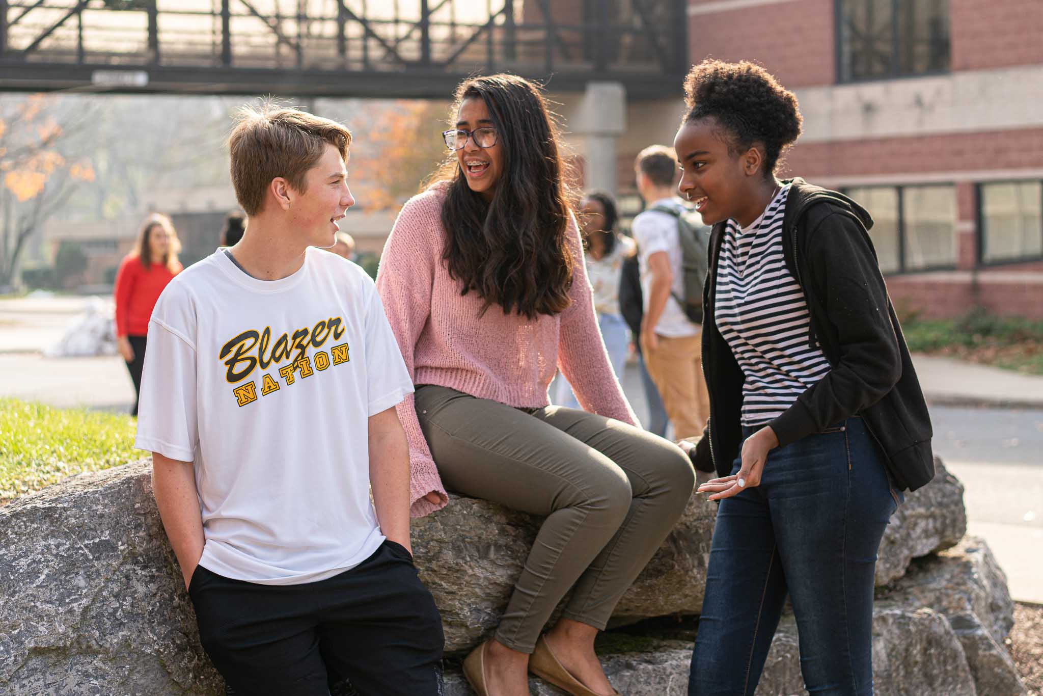 three LMMS students outside