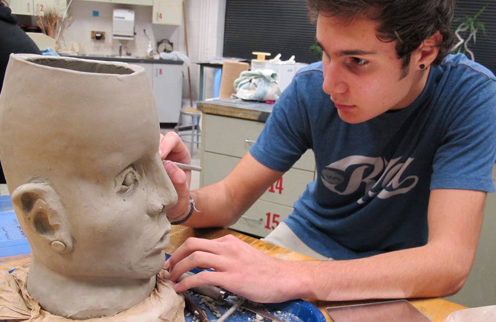 student sculpting