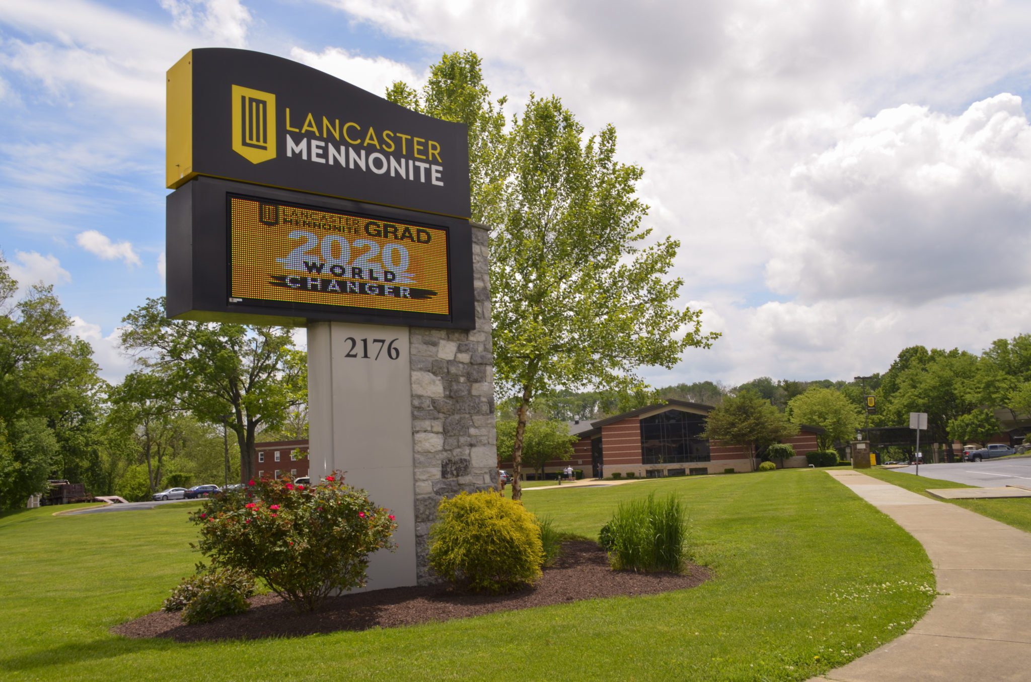 Road sign and campus view