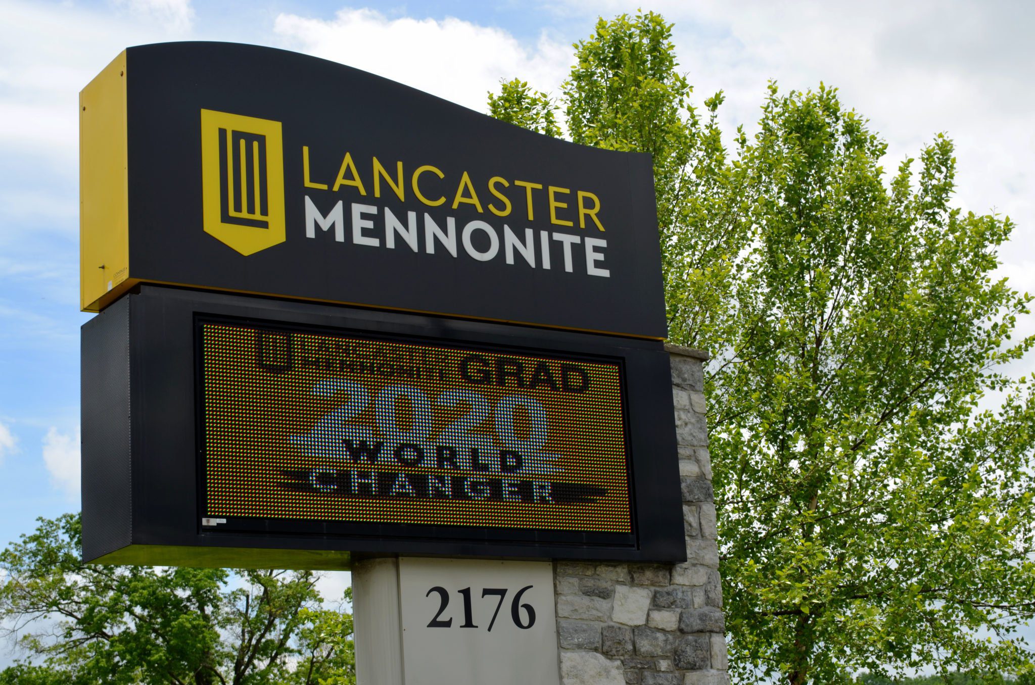 graduation sign from road