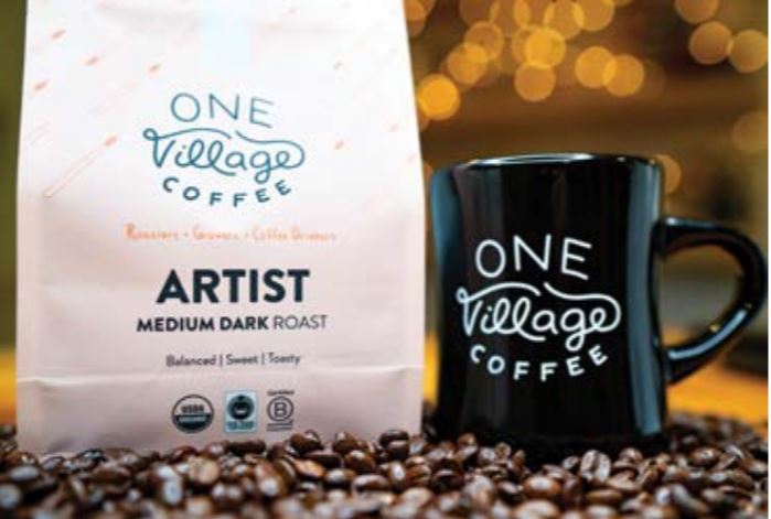 one village coffee and cup