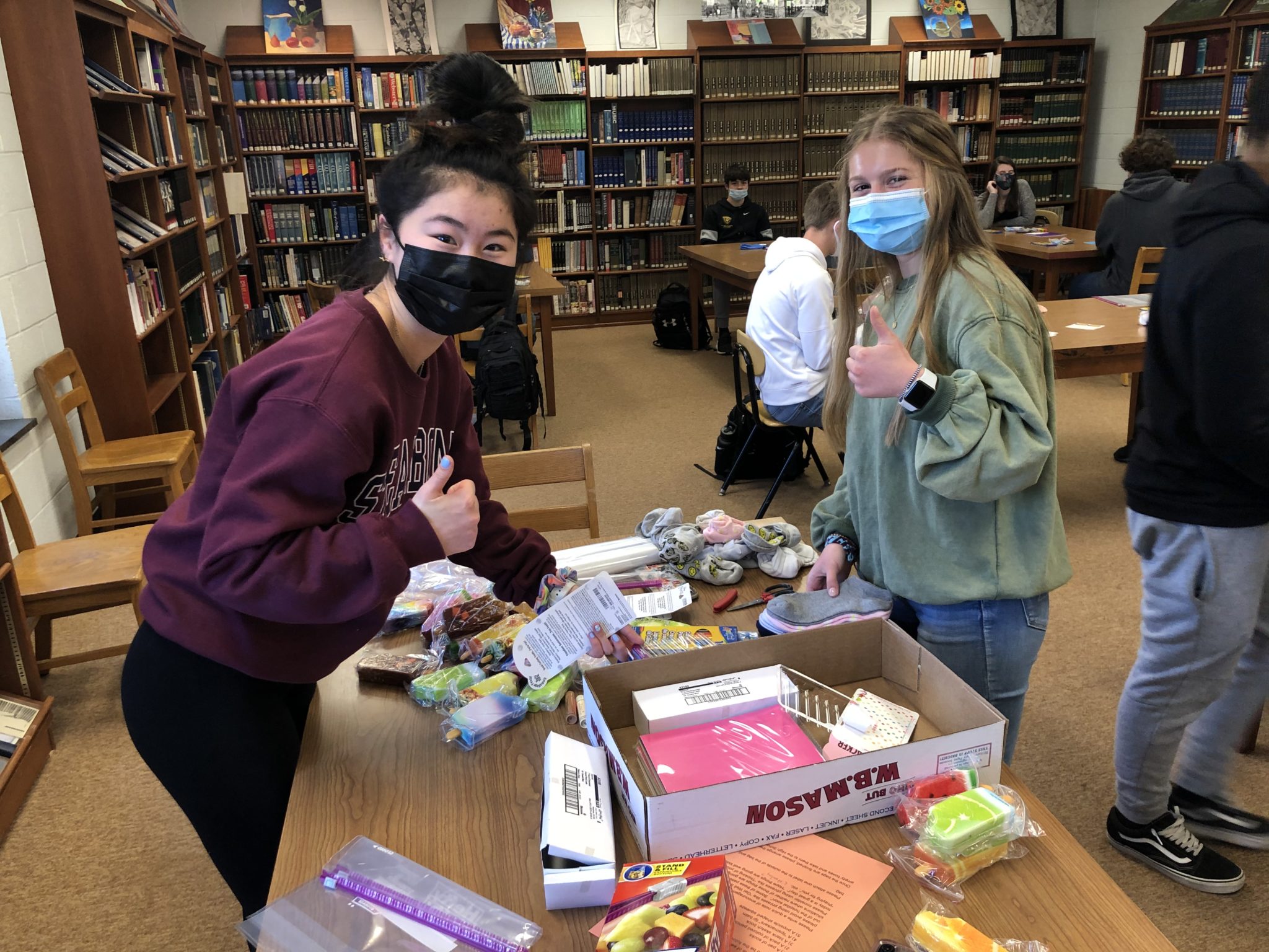 students packing care packages