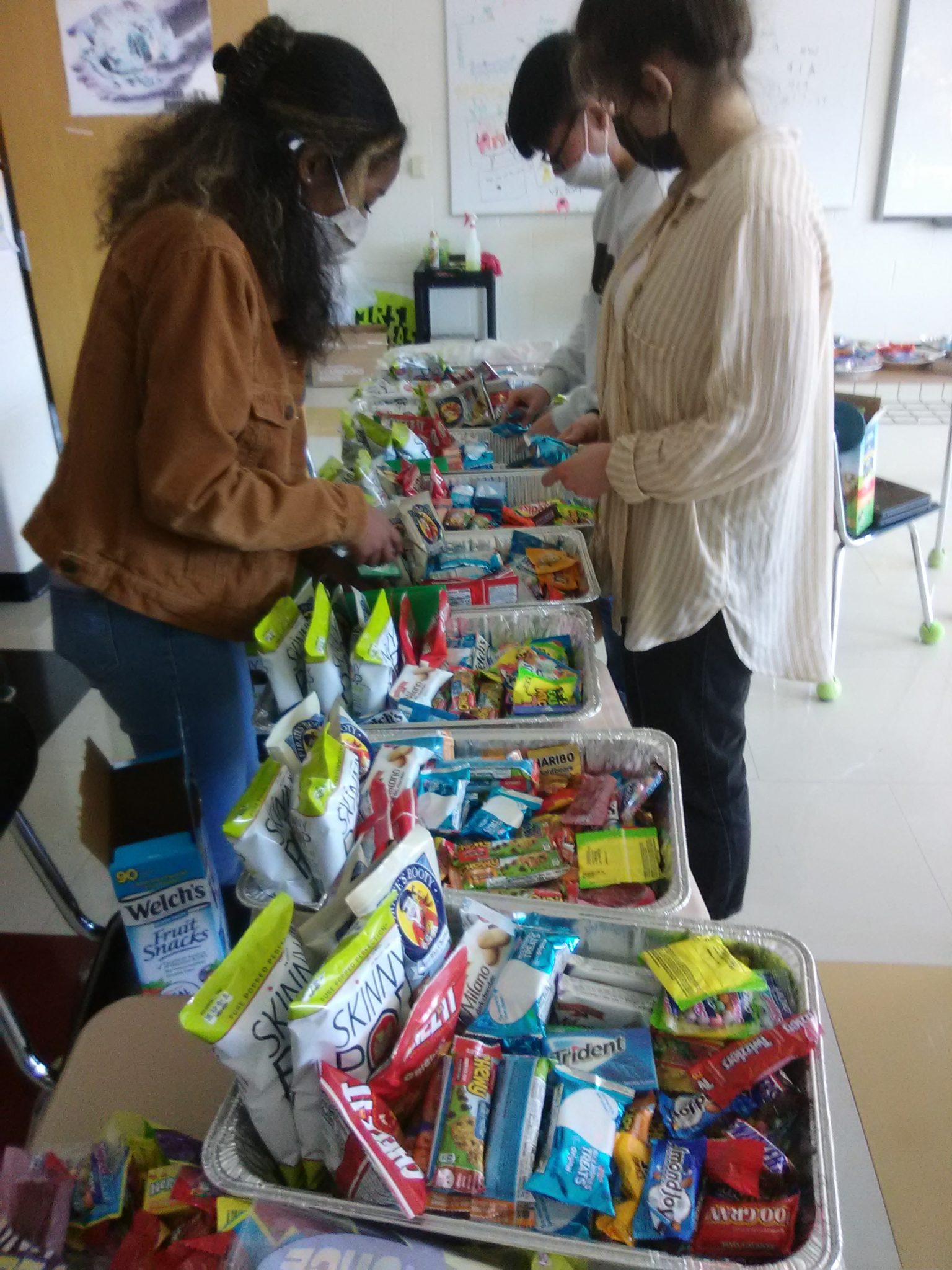 students preparing care packages