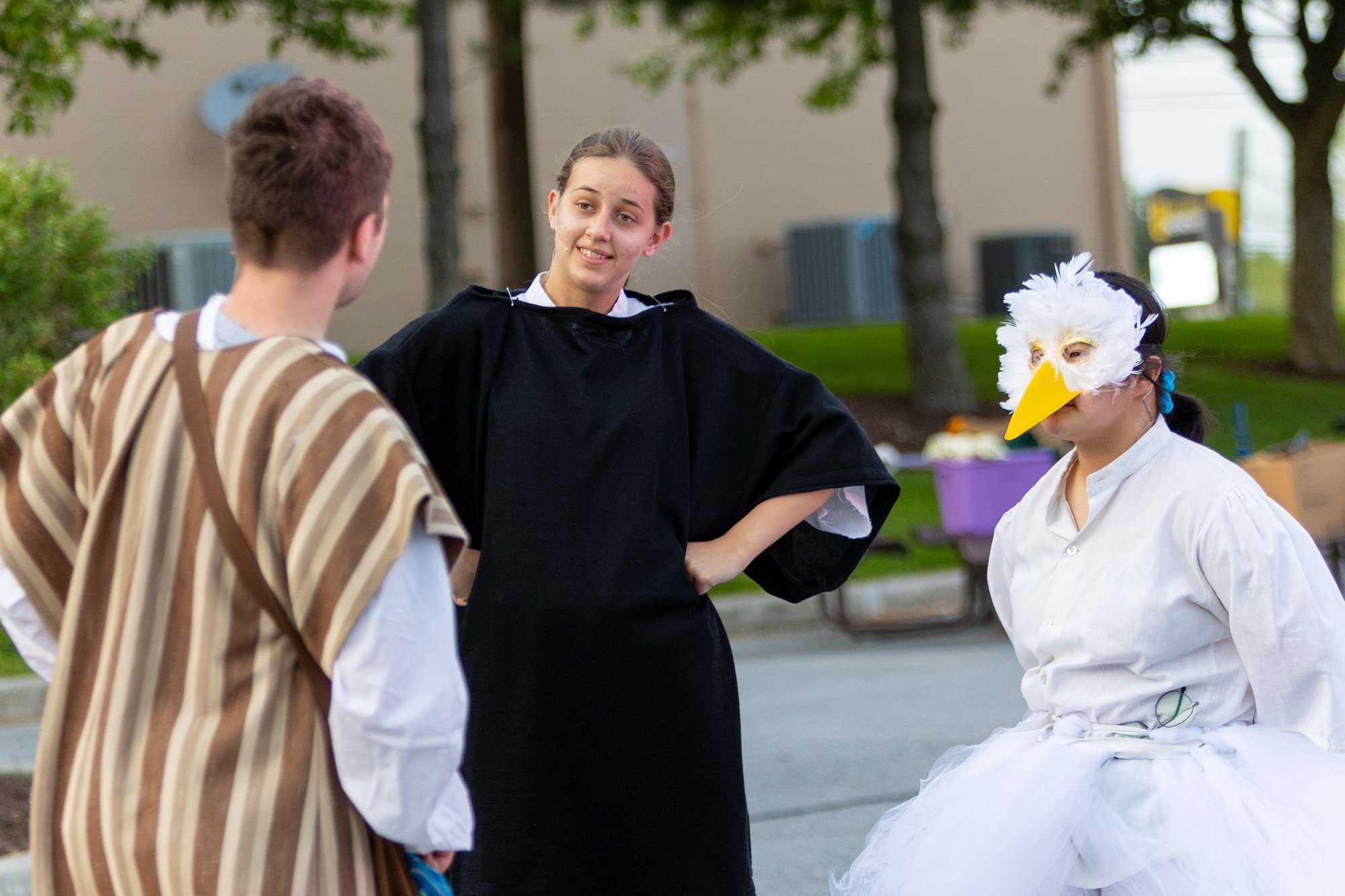 students acting during the performance of all the worlds a stage