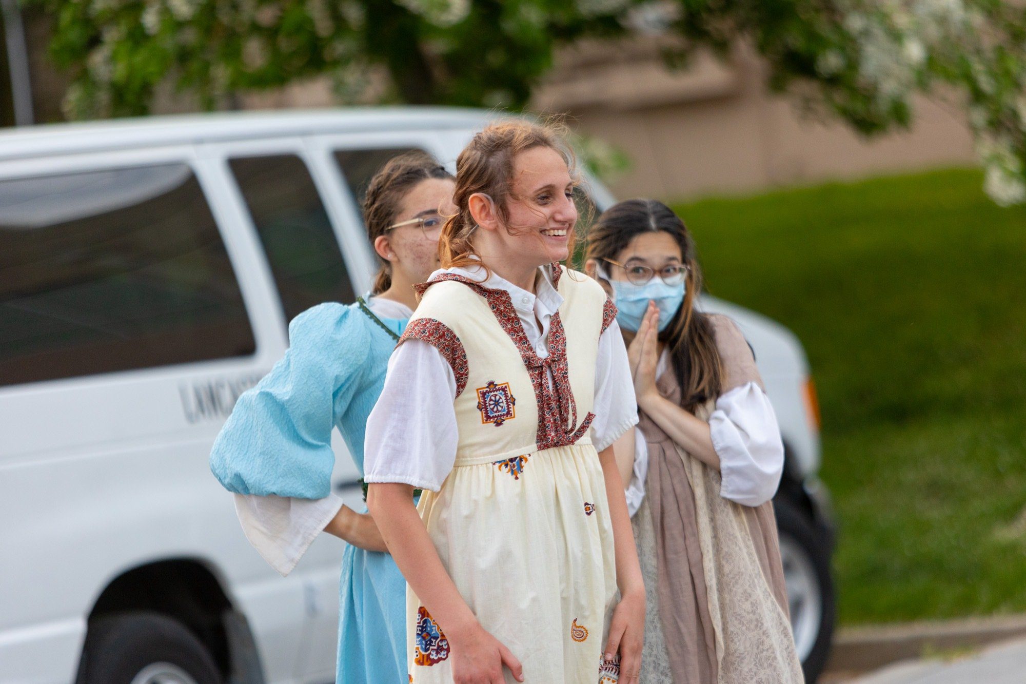 student acting during the performance of all the worlds a stage