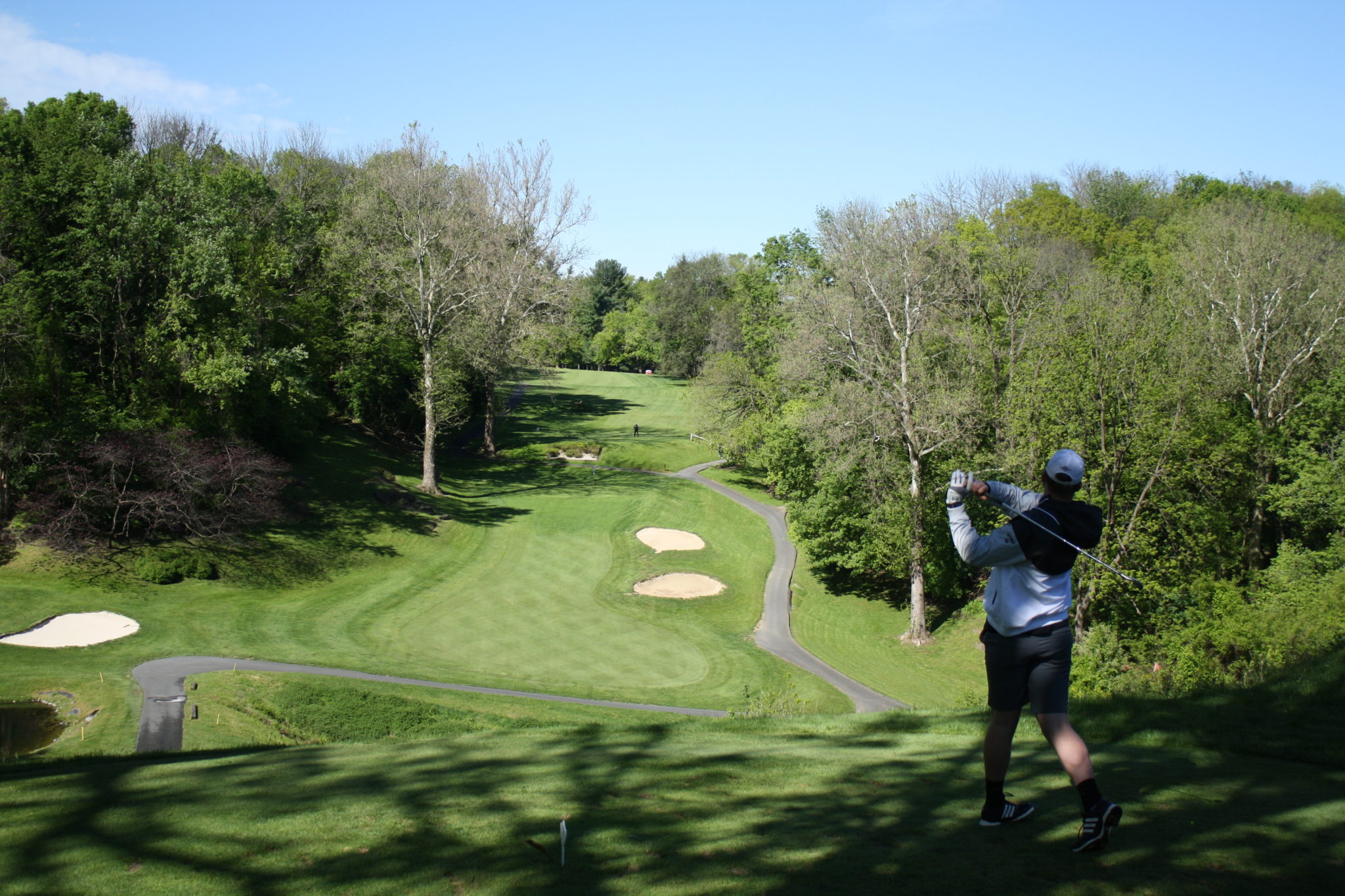 golfer hitting a long drive