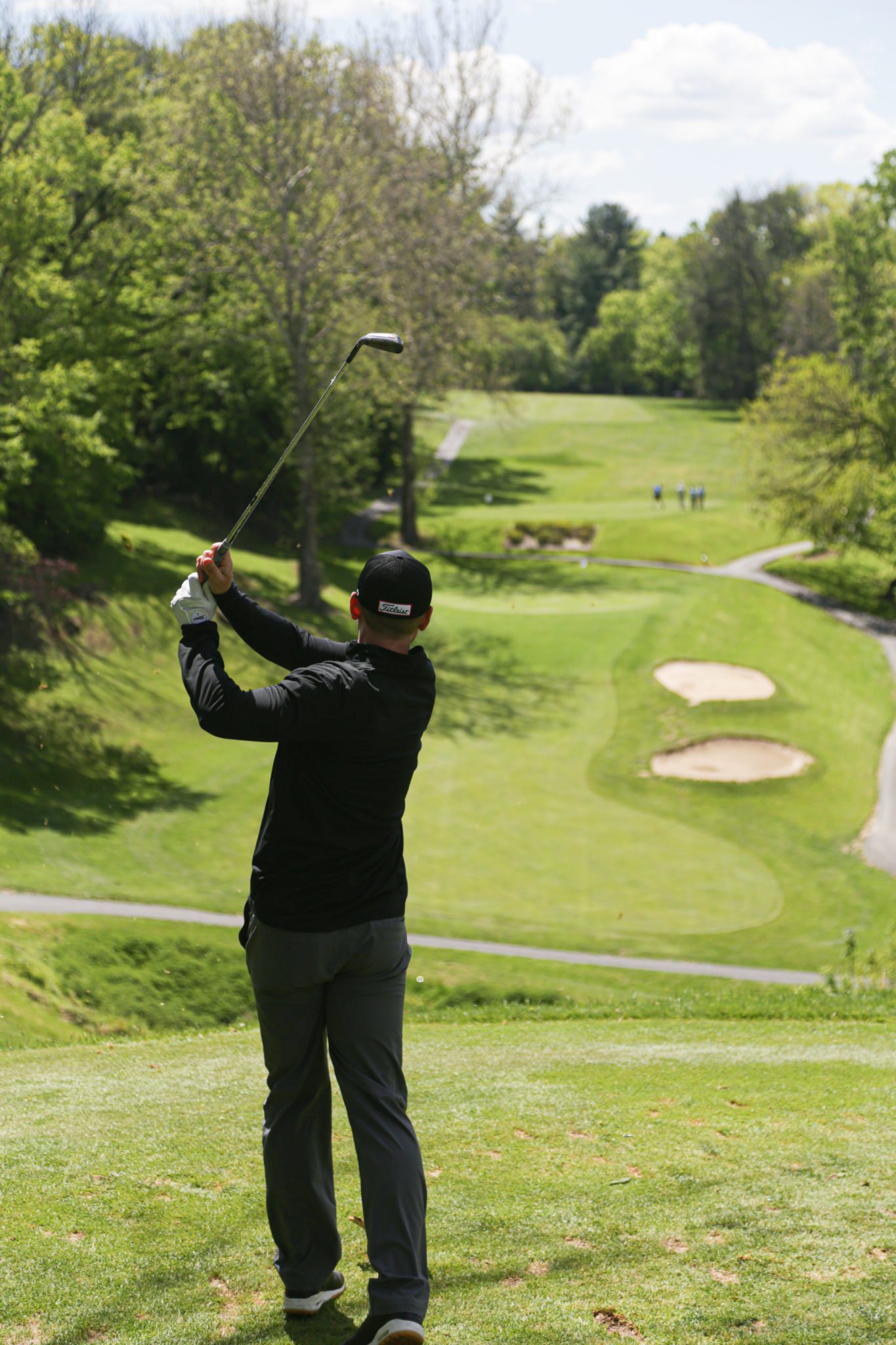 male golfing