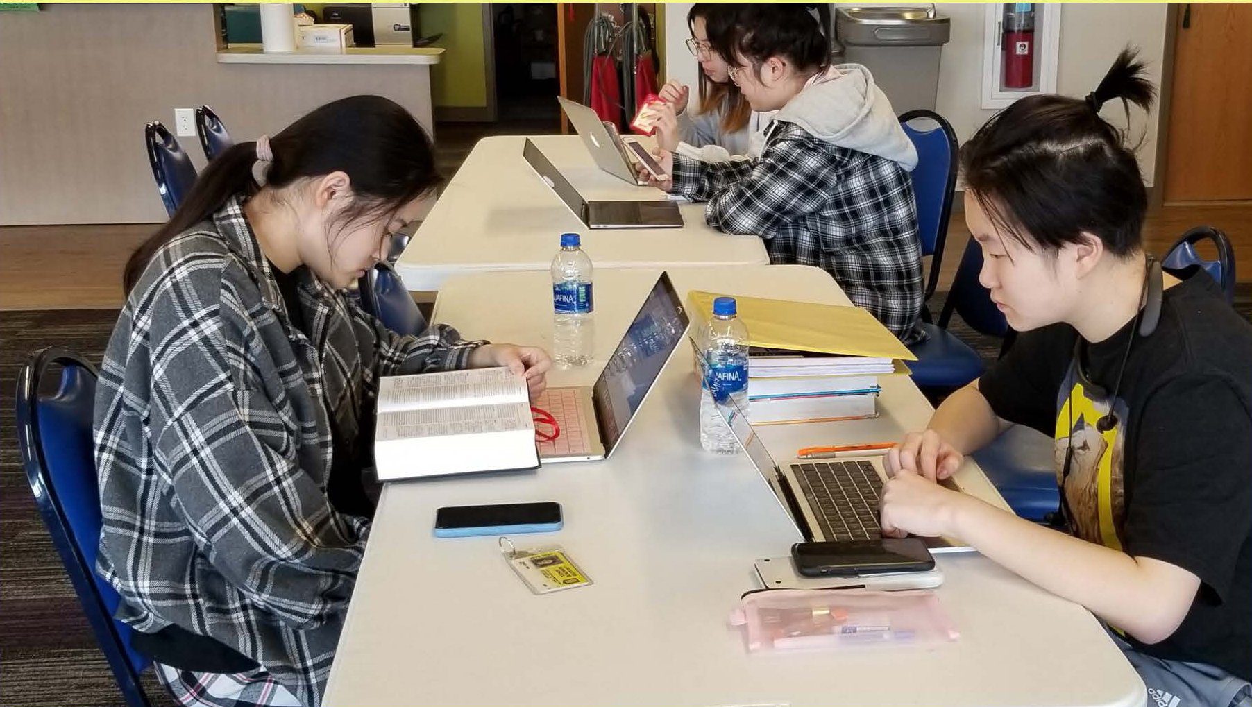 students studying at a table