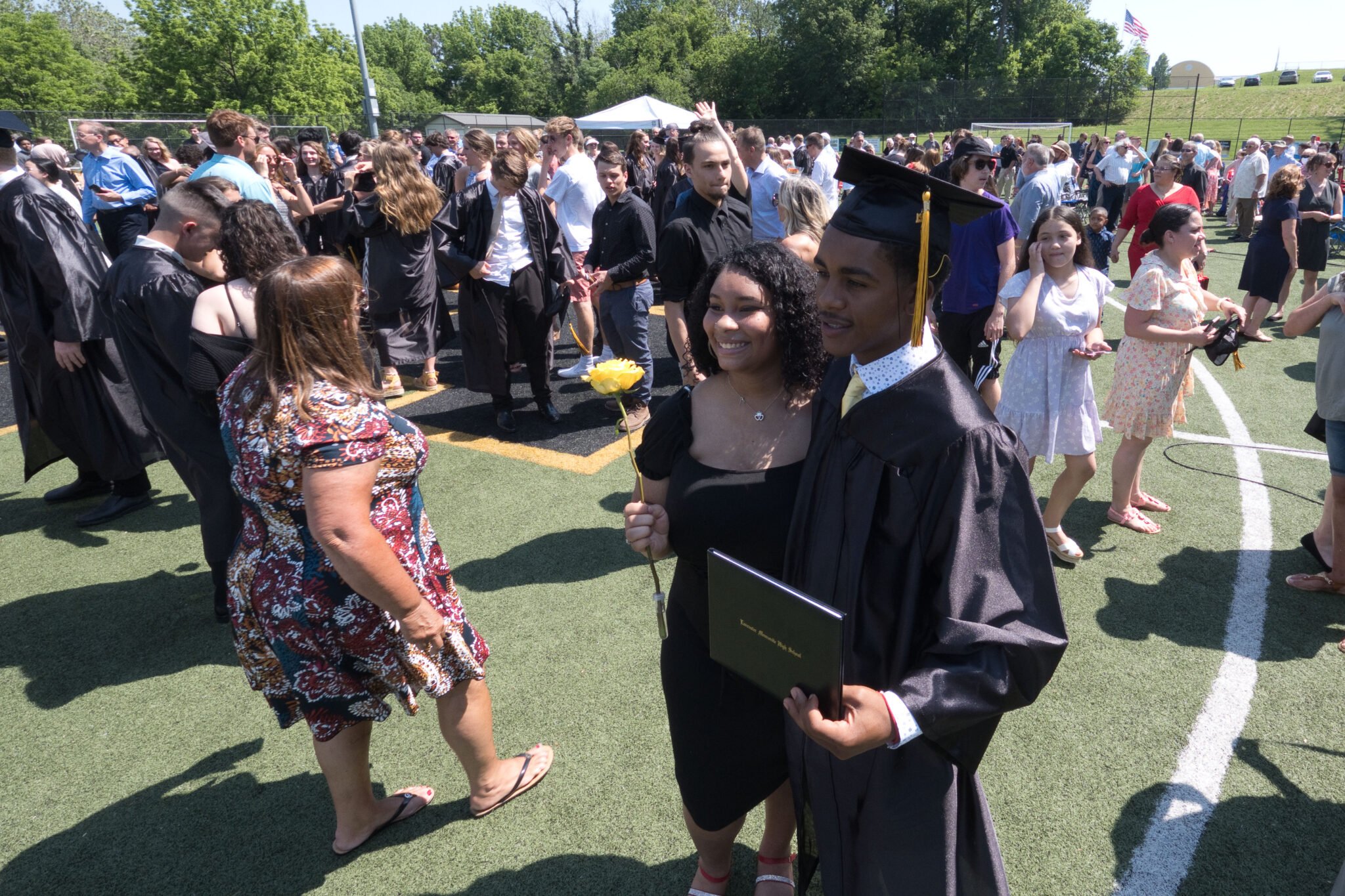 family and friends celebrate graduation