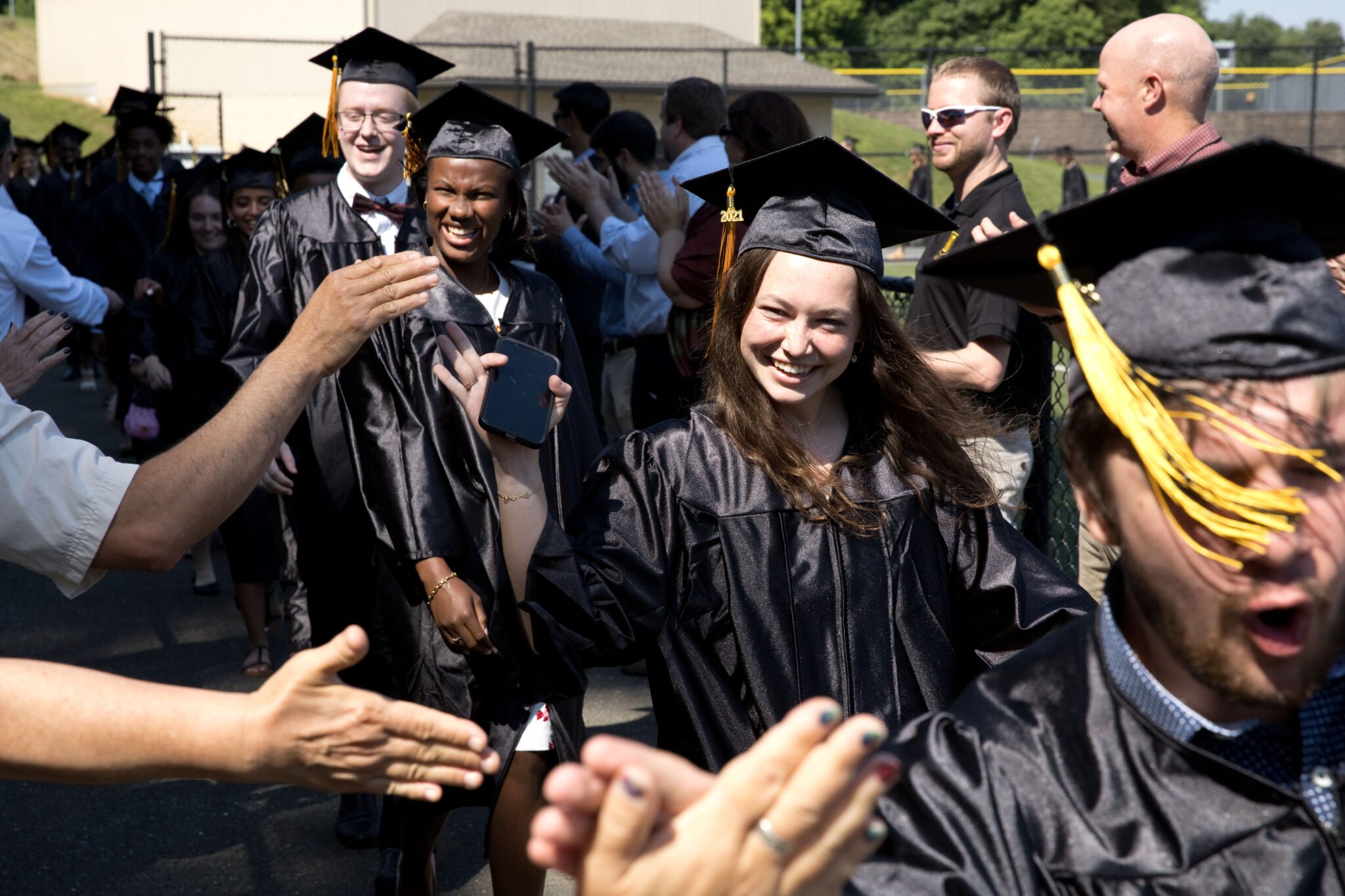 family and friends celebrate graduation