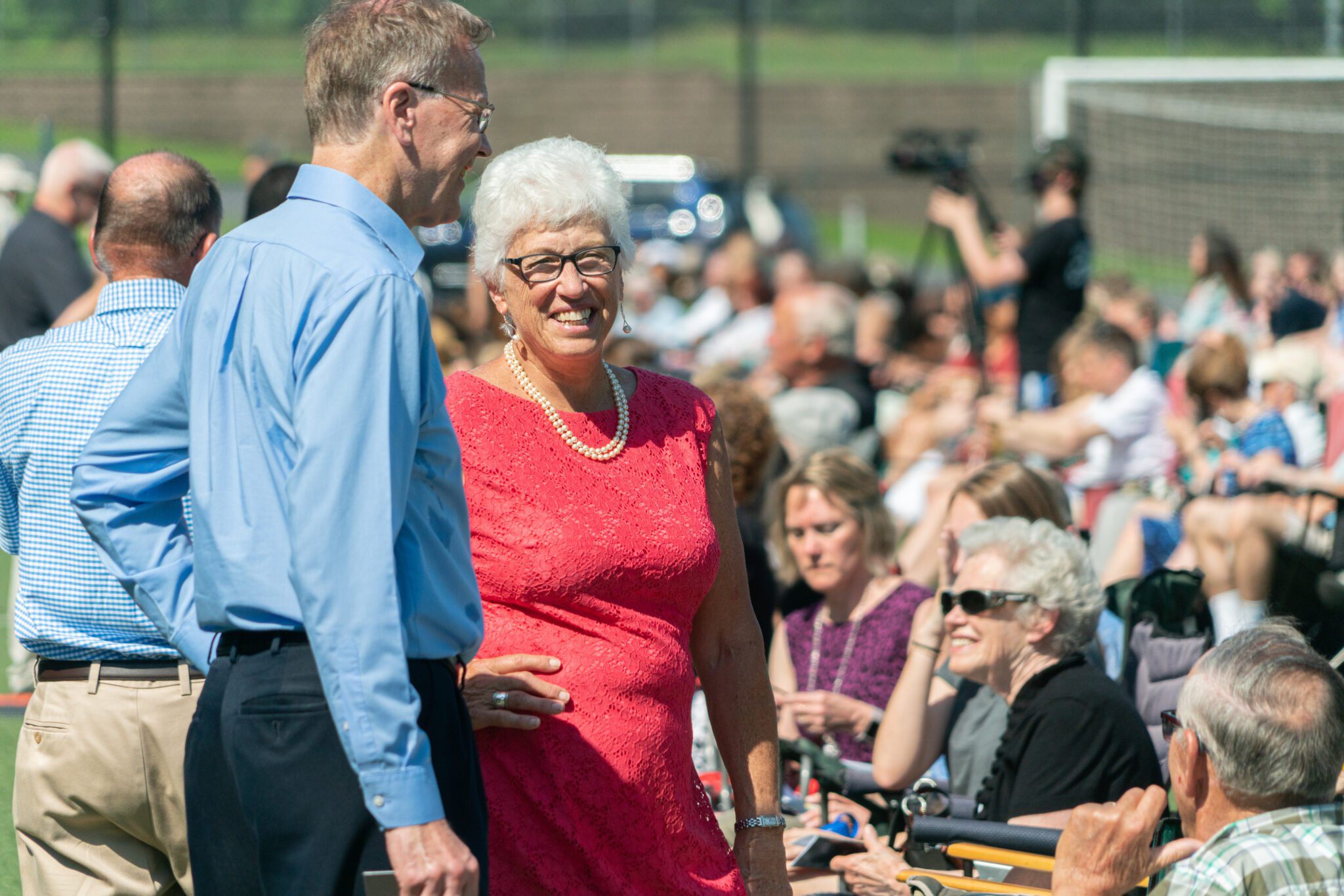 family talking before commencement service