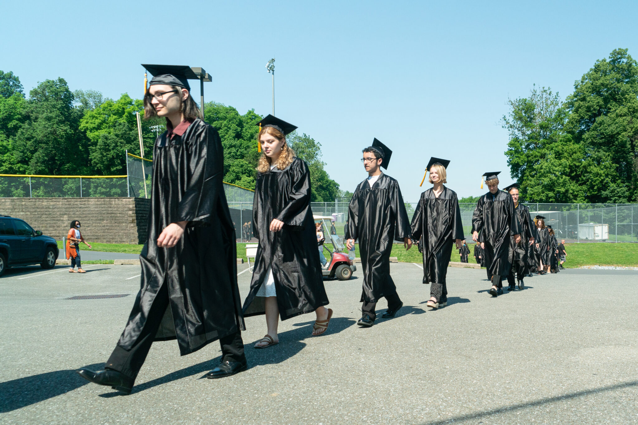 graduates walking into commencement