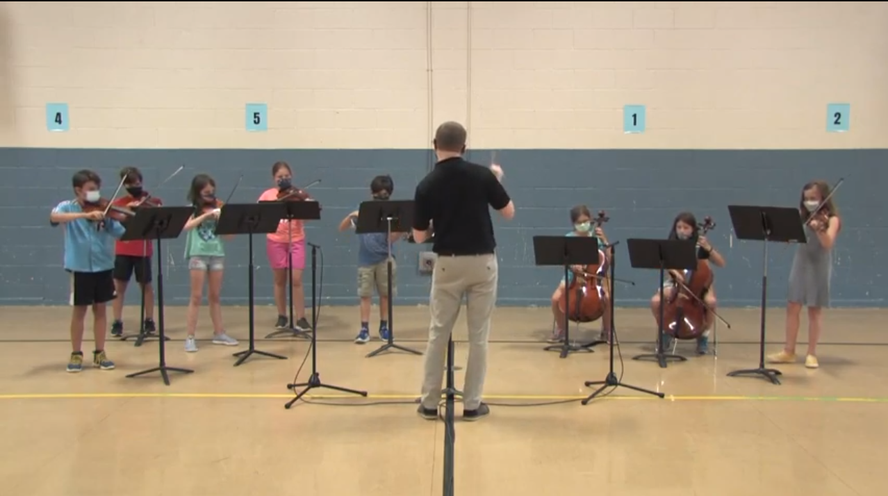 5th grade students at locust grove campus playing in orchestra