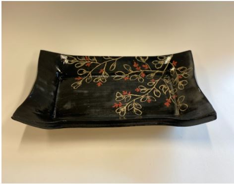 black and red ceramic platter