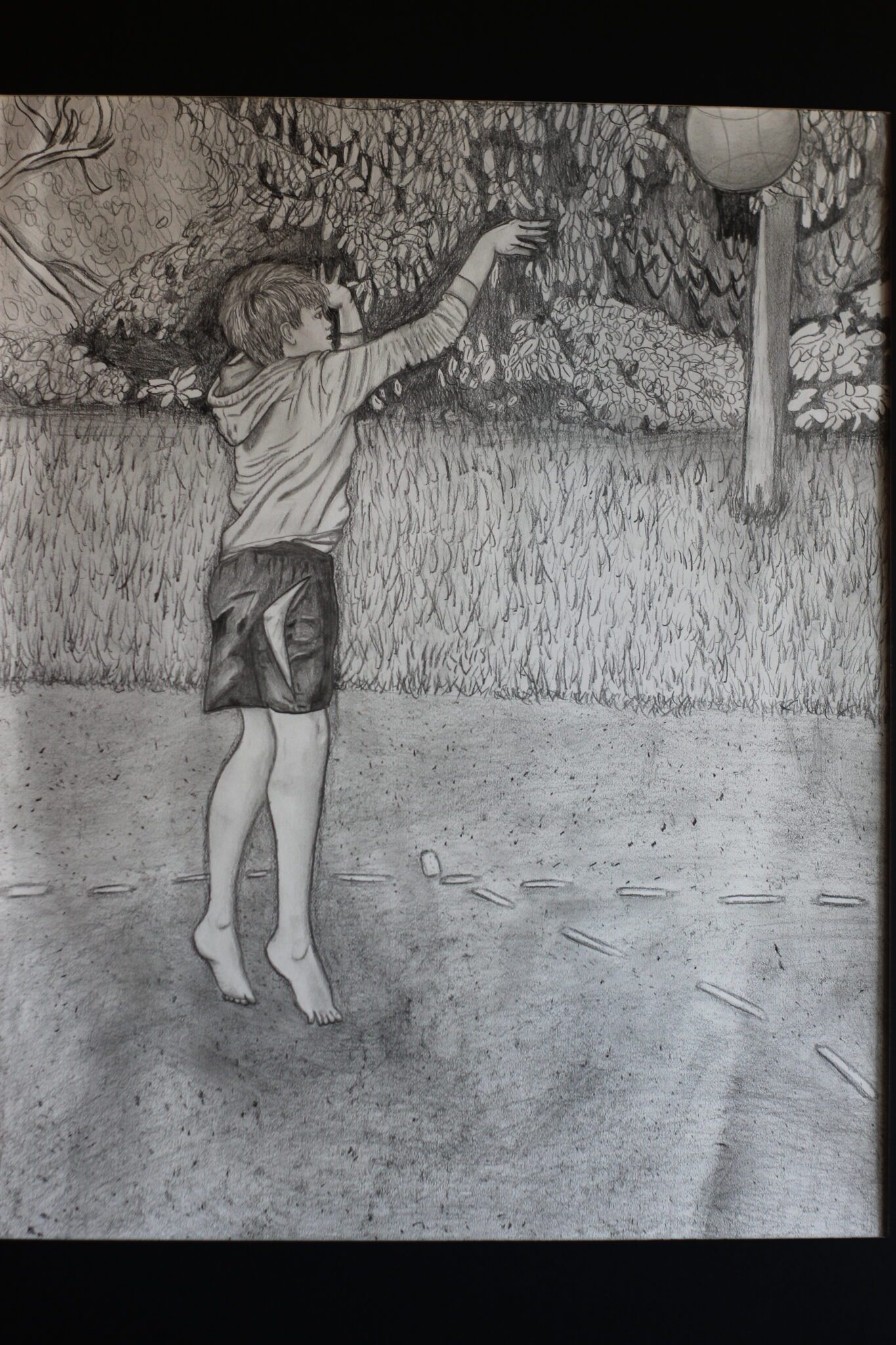 sketch of boy playing basketball