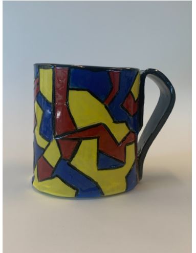 ceramic mug with bright colored lines