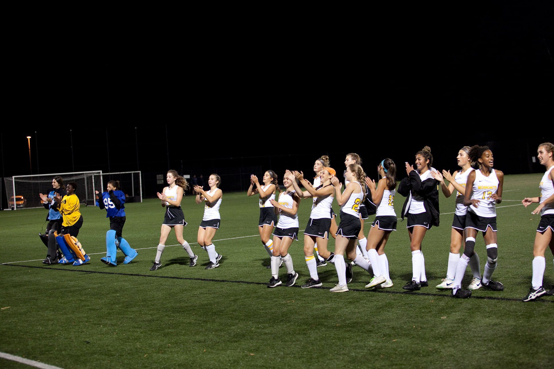 Field hockey players on the turf