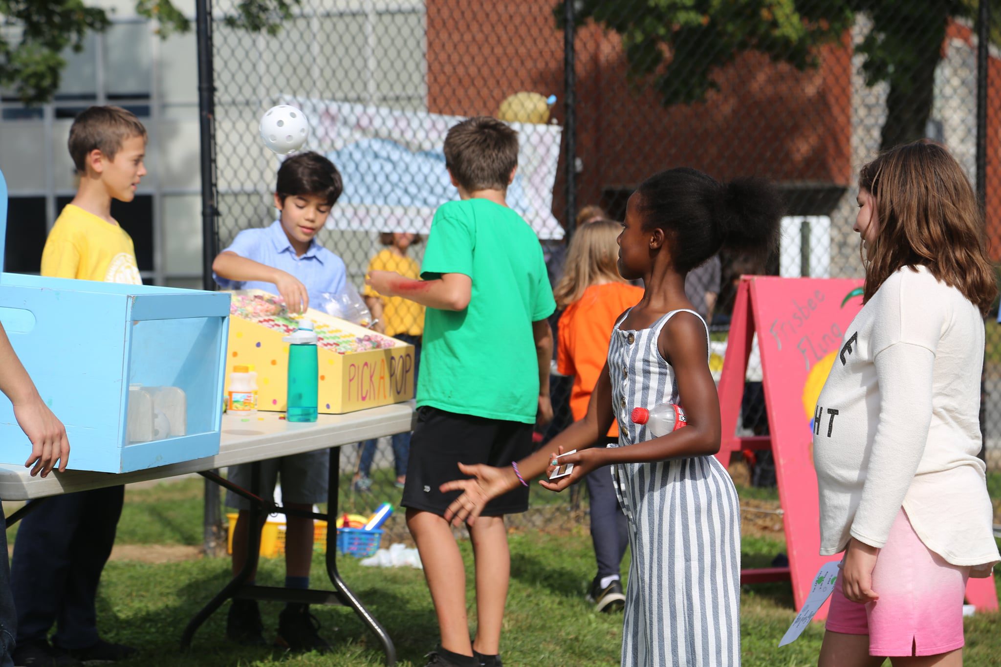 students at carnival games