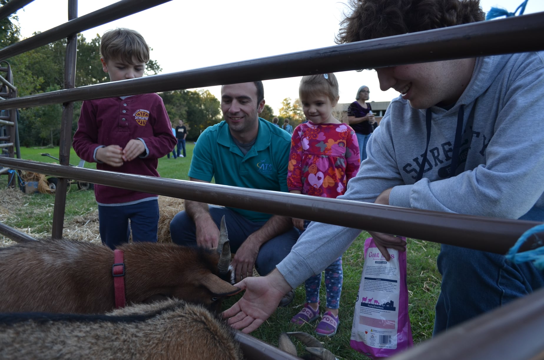 people at the petting zoo