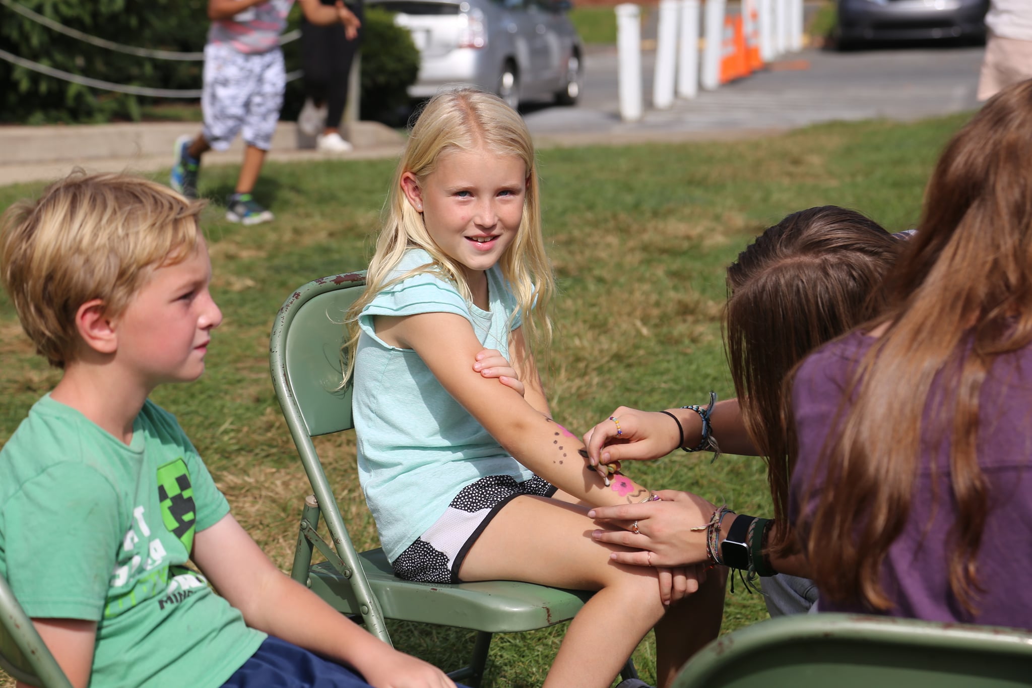 students getting face painting