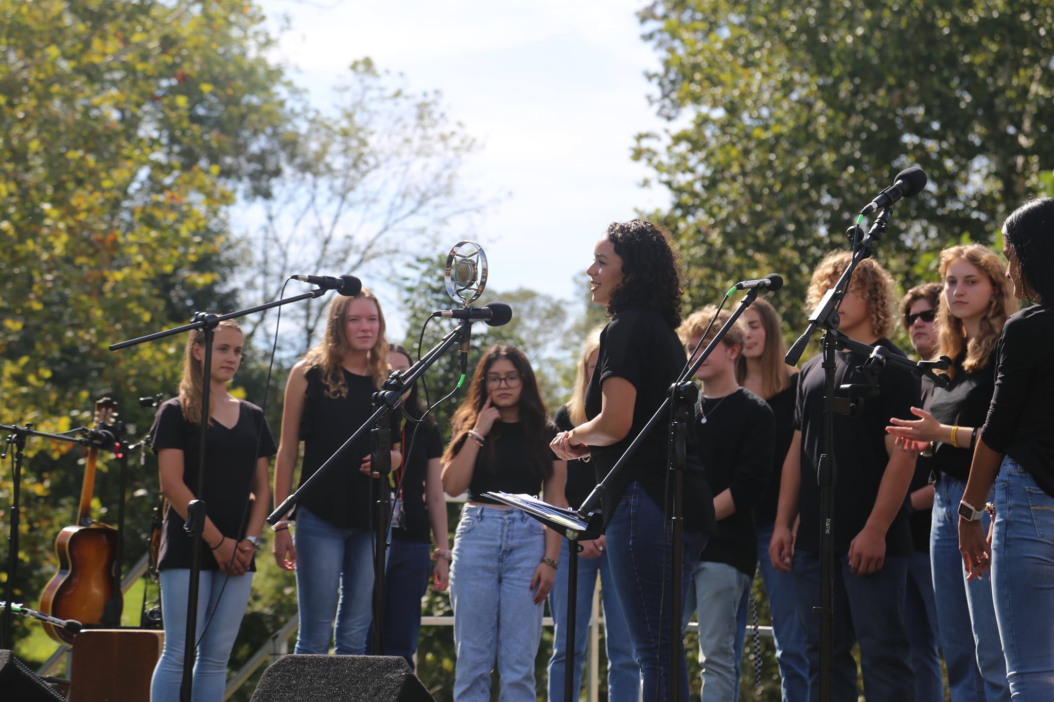 Students singing outside