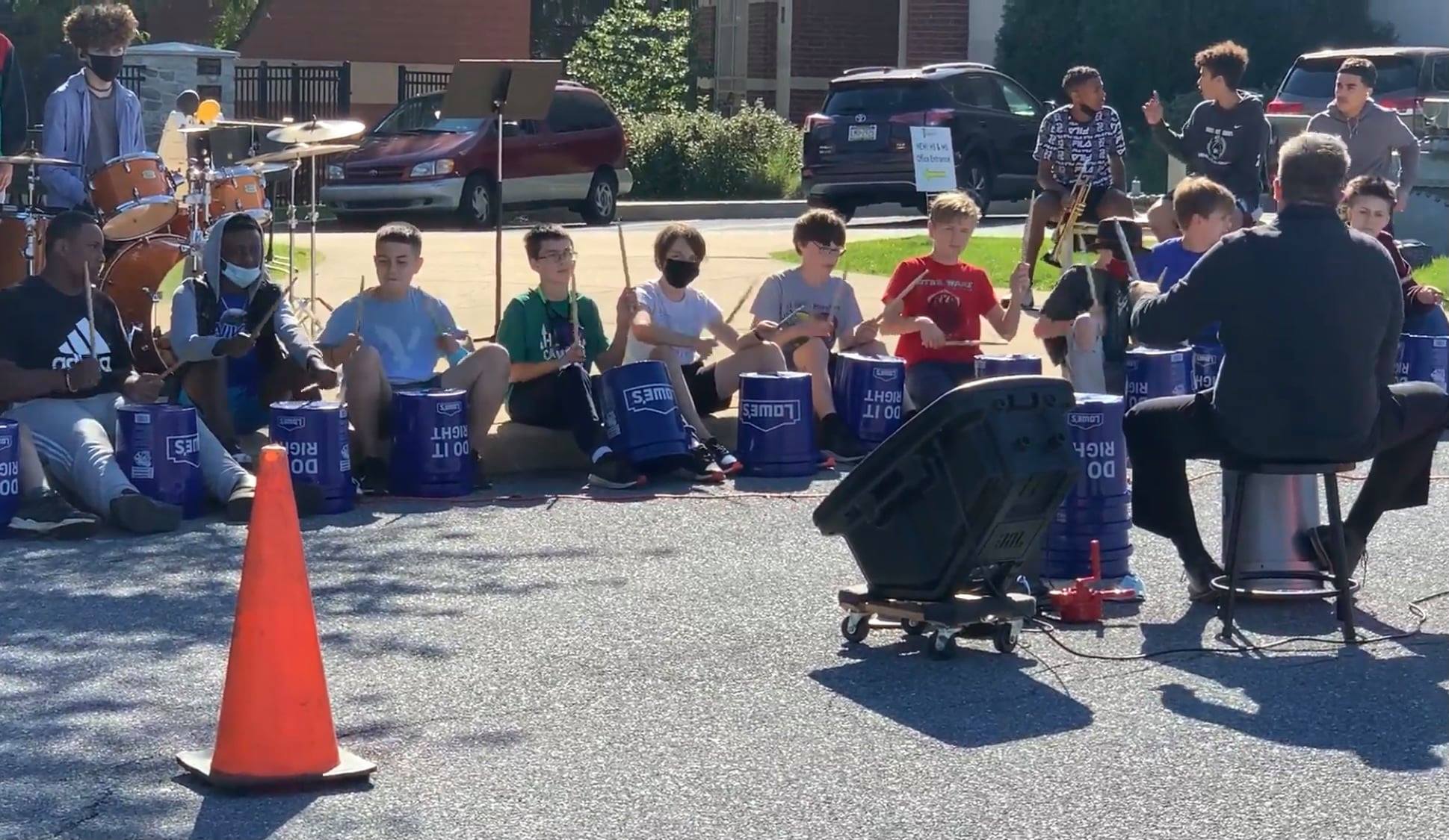 students drumming