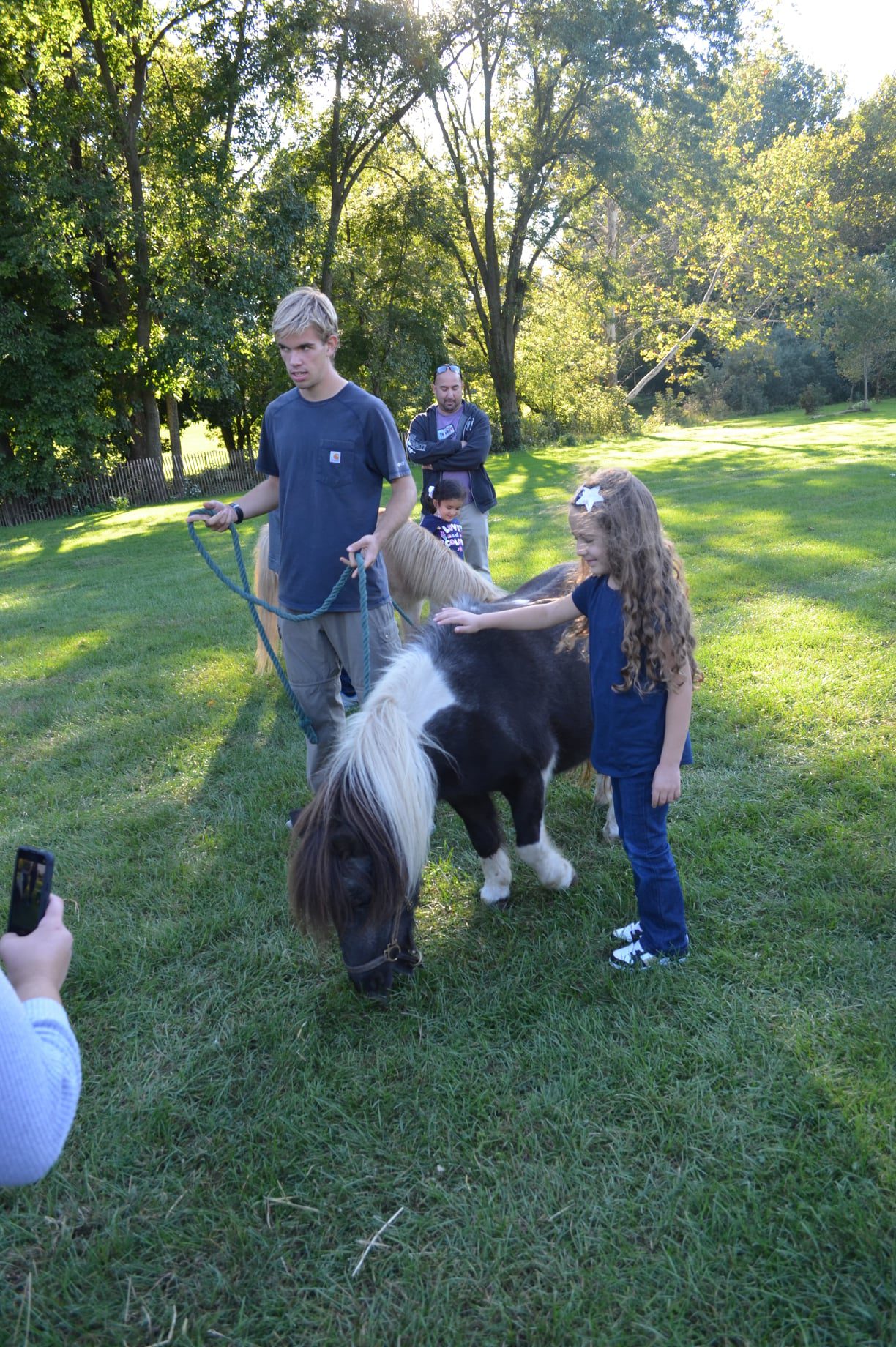 students at petting zoo
