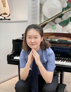 student with piano